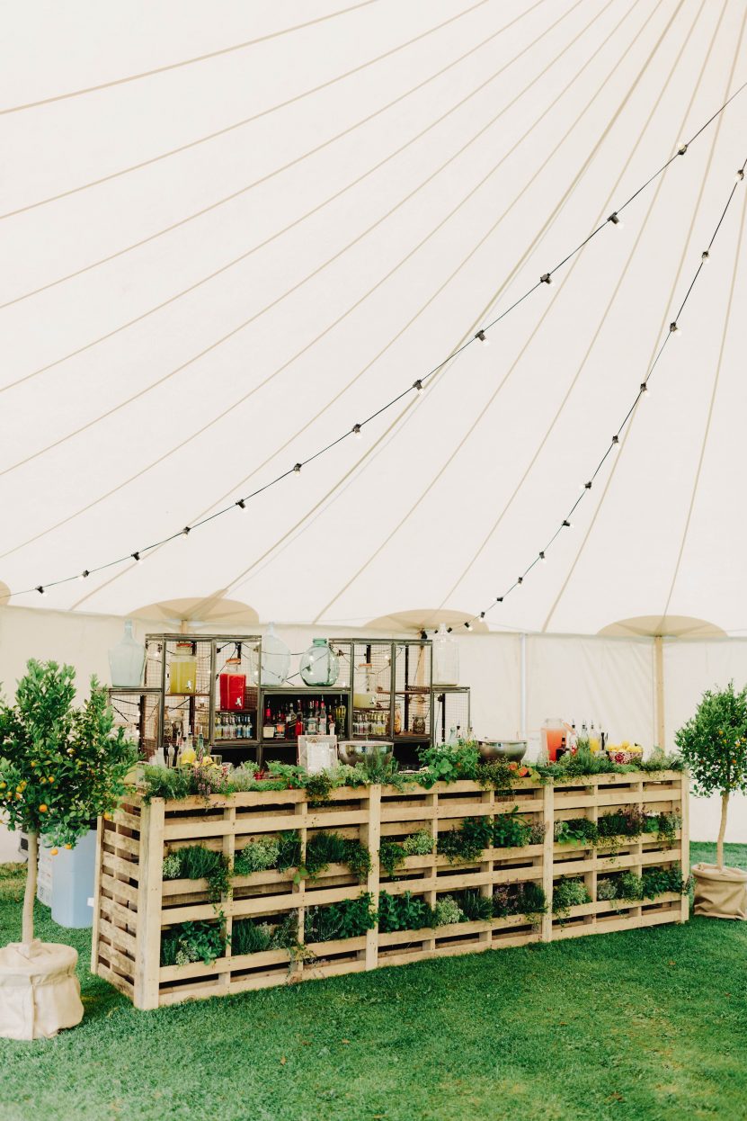 Bar overflowing with fresh herbs brings the outside in PapaKåta Sperry Tent Wedding at West Dean Gardens, Chichester, West Sussex, by Cinzia Bruschini