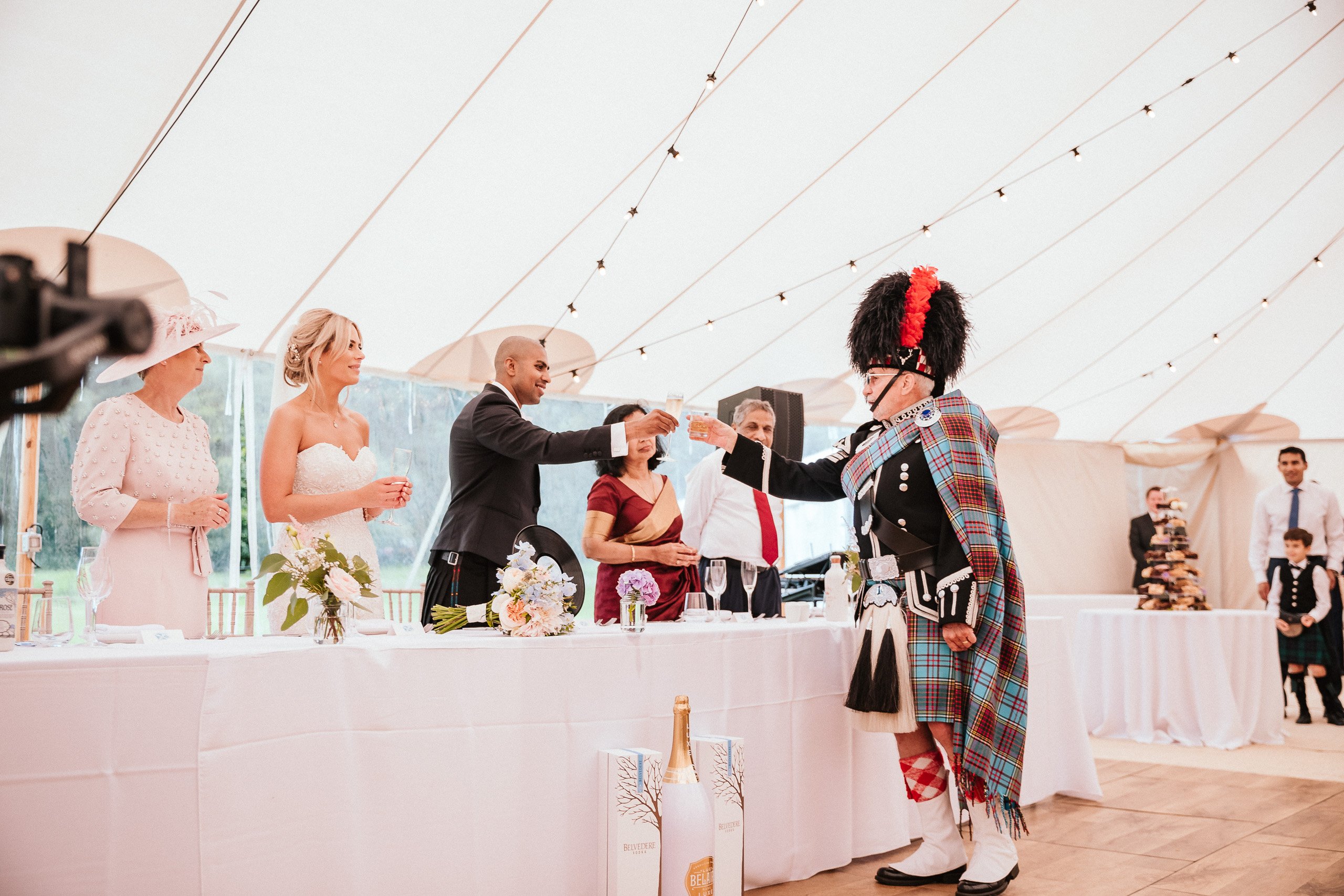 PapaKåta couple April & Martin's Sperry wedding at Arniston House, Scotland captured by Laurence Howe Photography- Toast to the couple PapaKåta couple April & Martin's Sperry wedding at Arniston House, Scotland captured by Laurence Howe Photography- Toast to the couple