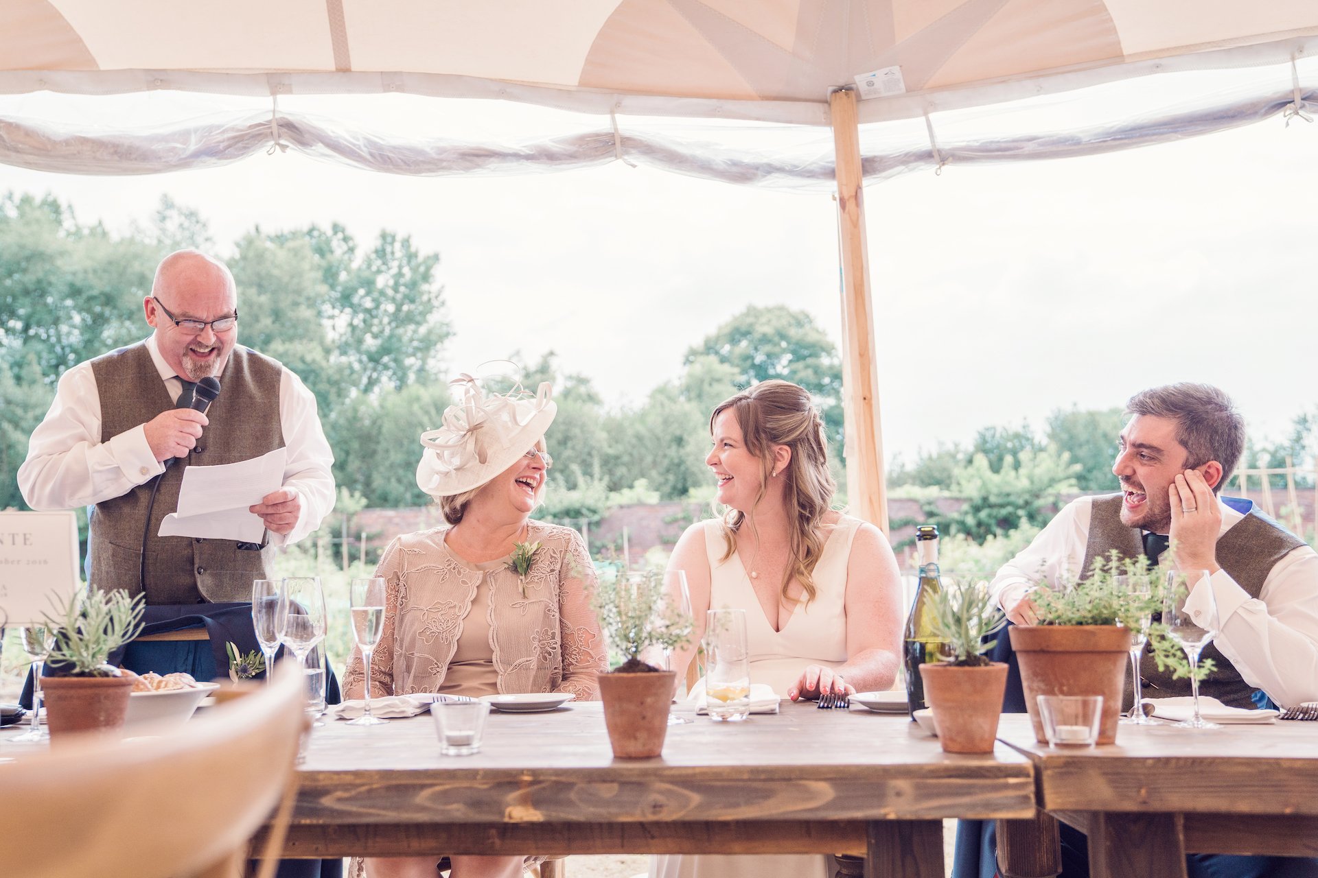 PapaKåta couple Louise & Alex's Sperry Wedding at Elford Hall Garden, Staffordshire captured by Jessica Raphael Photography- Top table wedding party 