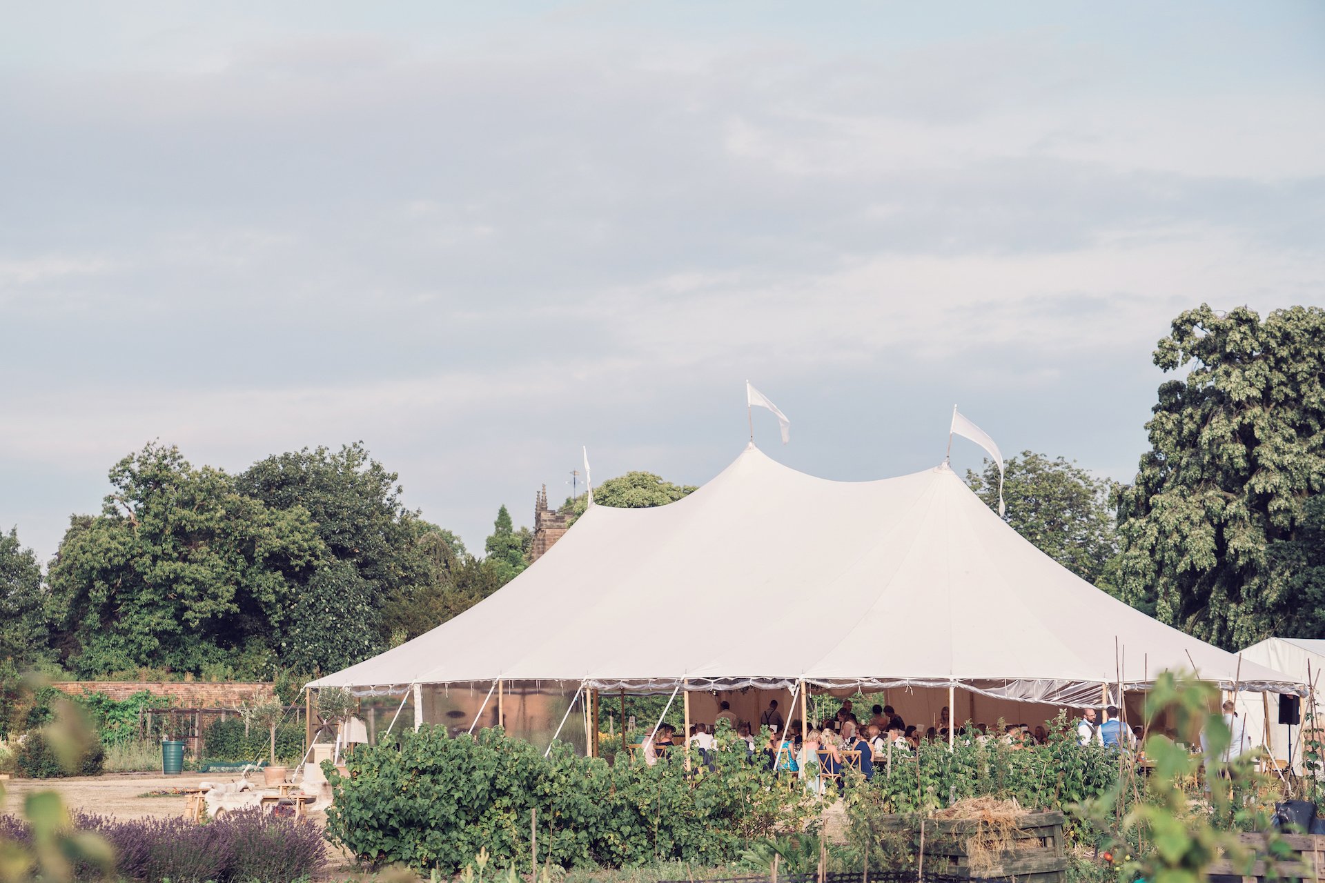 PapaKåta couple Louise & Alex's Sperry Wedding at Elford Hall Garden, Staffordshire captured by Jessica Raphael Photography- Sperry Tent external