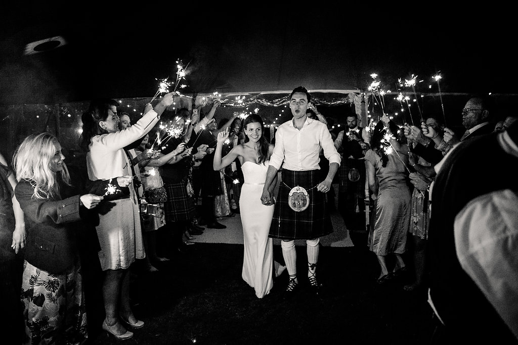 PapaKåta couple Lucy & Tom's Sperry Wedding at Gordon Castle Scotland captured by Helen Abraham Photography- Sparkler Walkway