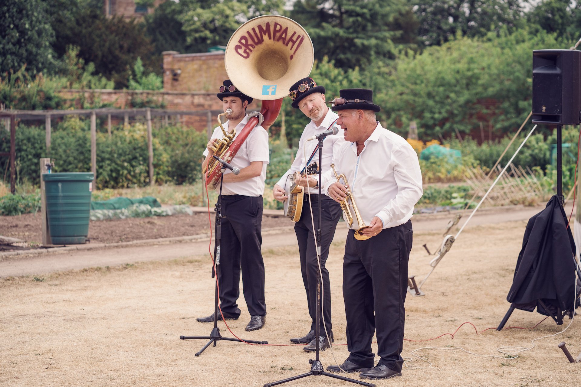 PapaKåta couple Louise & Alex's Sperry Wedding at Elford Hall Garden, Staffordshire captured by Jessica Raphael Photography- Grumpah Brass Band