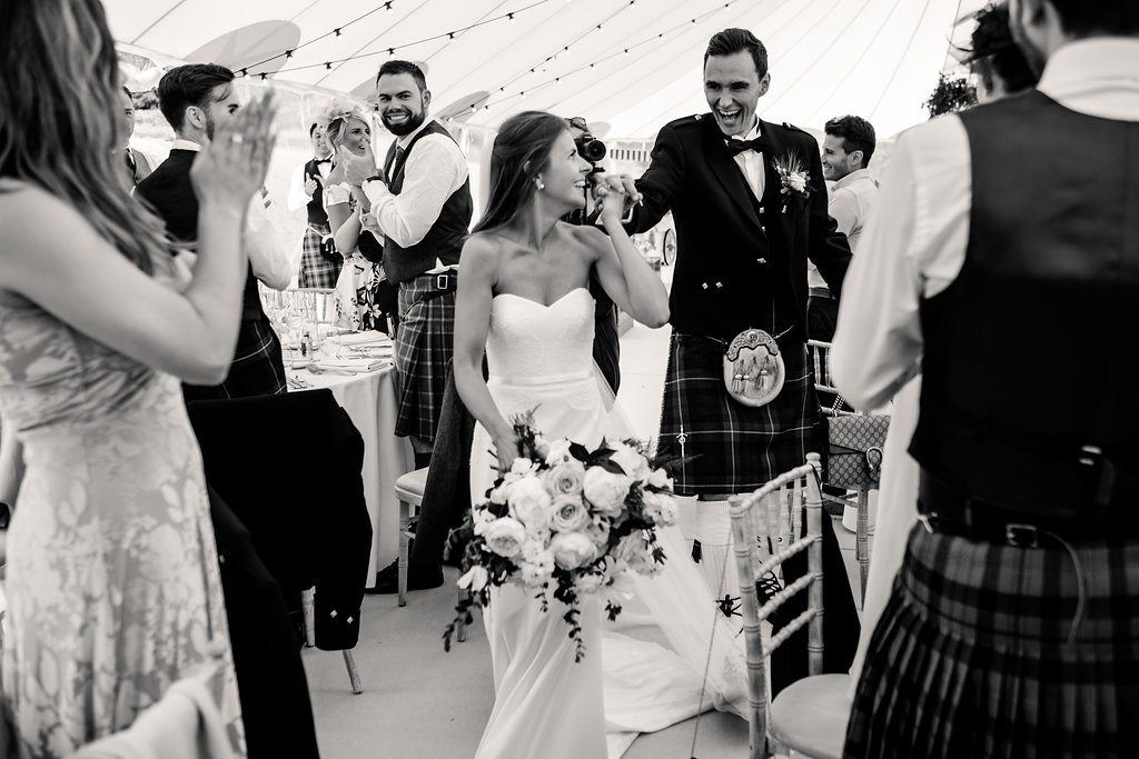 PapaKåta couple Lucy &amp; Tom's Sperry Wedding at Gordon Castle Scotland captured by Helen Abraham Photography- Making an entrance