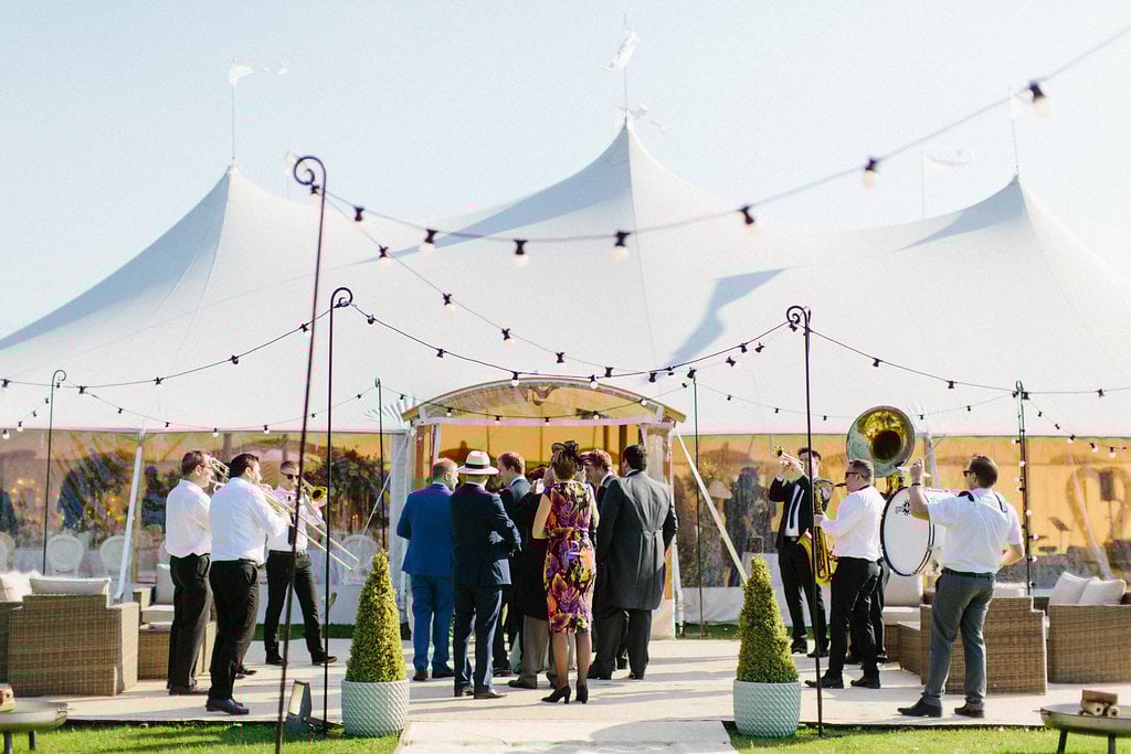 PapaKåta couple Georgina & Steve Sperry Tent Wedding in Barnby Dun, Doncaster captured by Melissa Beattie- Festoon Terrace with brass band by Warble Entertainment