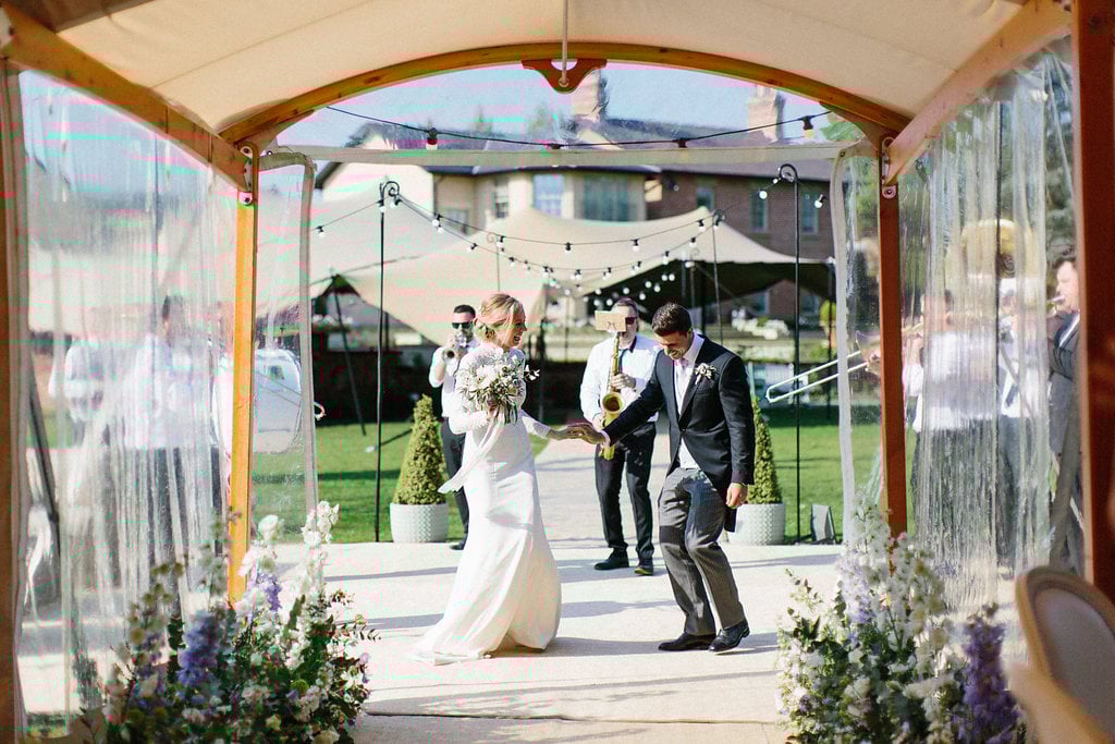 PapaKåta couple Georgina & Steve Sperry Tent Wedding in Barnby Dun, Doncaster captured by Melissa Beattie- Bride & Groom making an entrance 