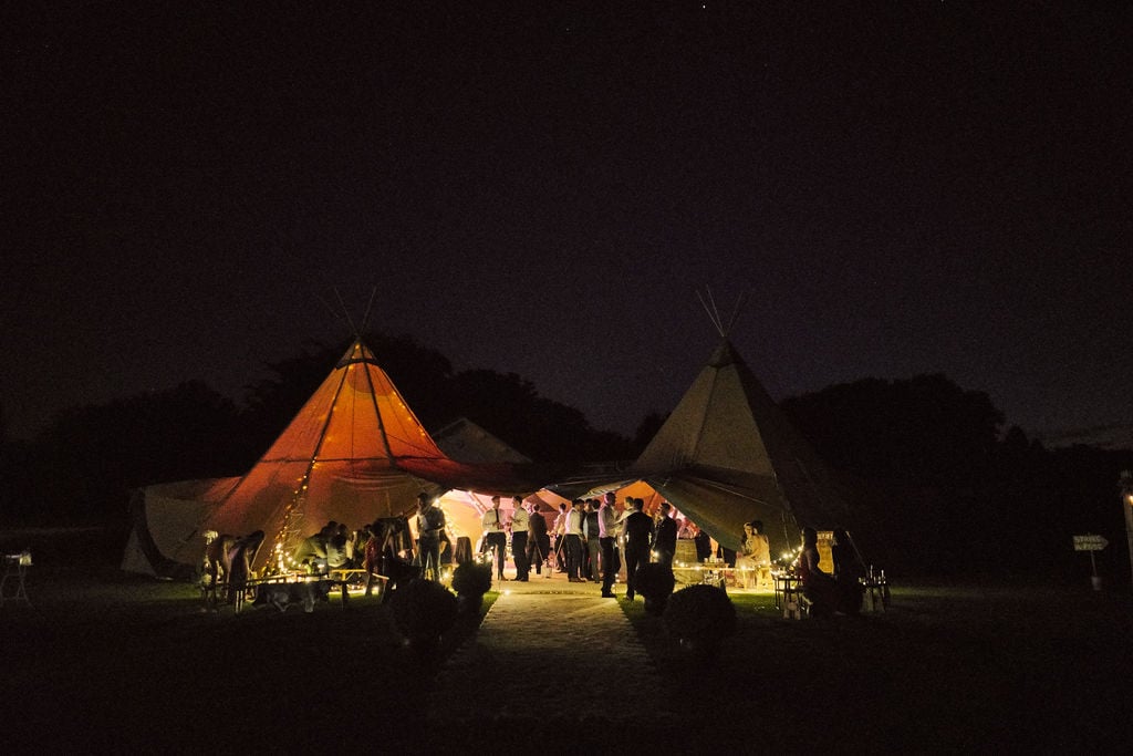 PapaKåta couple Lucy & Chris' Teepee Wedding in Terrington North Yorkshire captured by Chris Morse Photography- Teepee exterior at night 