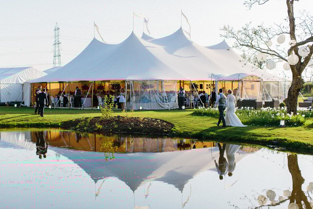 PapaKåta couple Georgina & Steve Sperry Tent Wedding in Barnby Dun, Doncaster captured by Melissa Beattie- Sperry Tent with lake views 