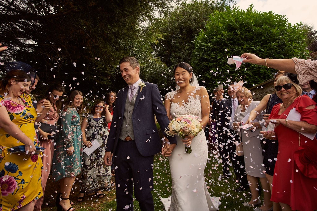PapaKåta couple Lucy & Chris' Teepee Wedding in Terrington North Yorkshire captured by Chris Morse Photography- Confetti throw