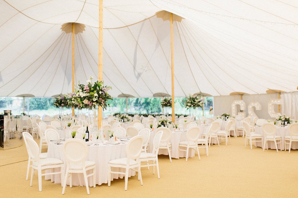 PapaKåta couple Georgina & Steve Sperry Tent Wedding in Barnby Dun, Doncaster captured by Melissa Beattie- Sperry Tent interior. Tables and Chairs by Furniture 4 Events 