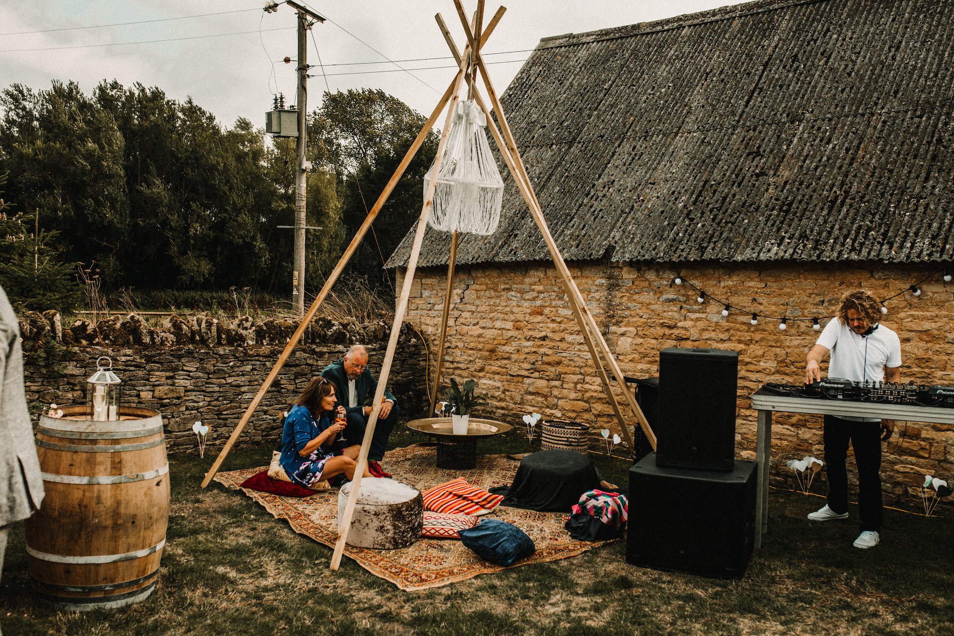 PapaKåta couple Hayley & Luke's Teepee Wedding in Ascott-Under-Wychwood, Oxon captured by Carla Blain Photography- Homemade tipi chill out