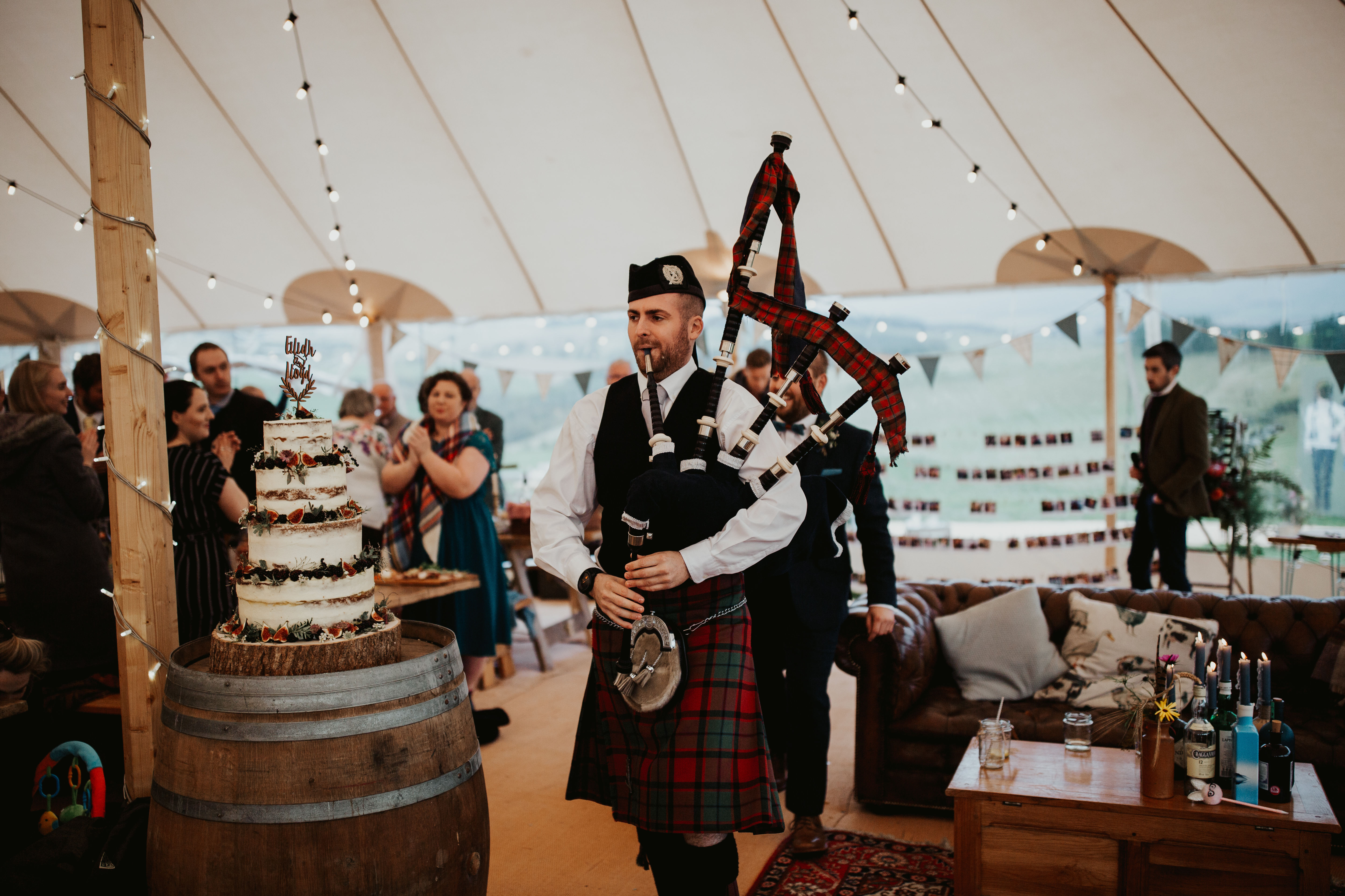PapaKåta couple Eilidh & Lloyd's Sperry Wedding in Glenfarg, Perthshire captured by Colin Ross Photography- Bagpipe entrance PapaKåta couple Eilidh & Lloyd's Sperry Wedding in Glenfarg, Perthshire captured by Colin Ross Photography- Bagpipe entrance