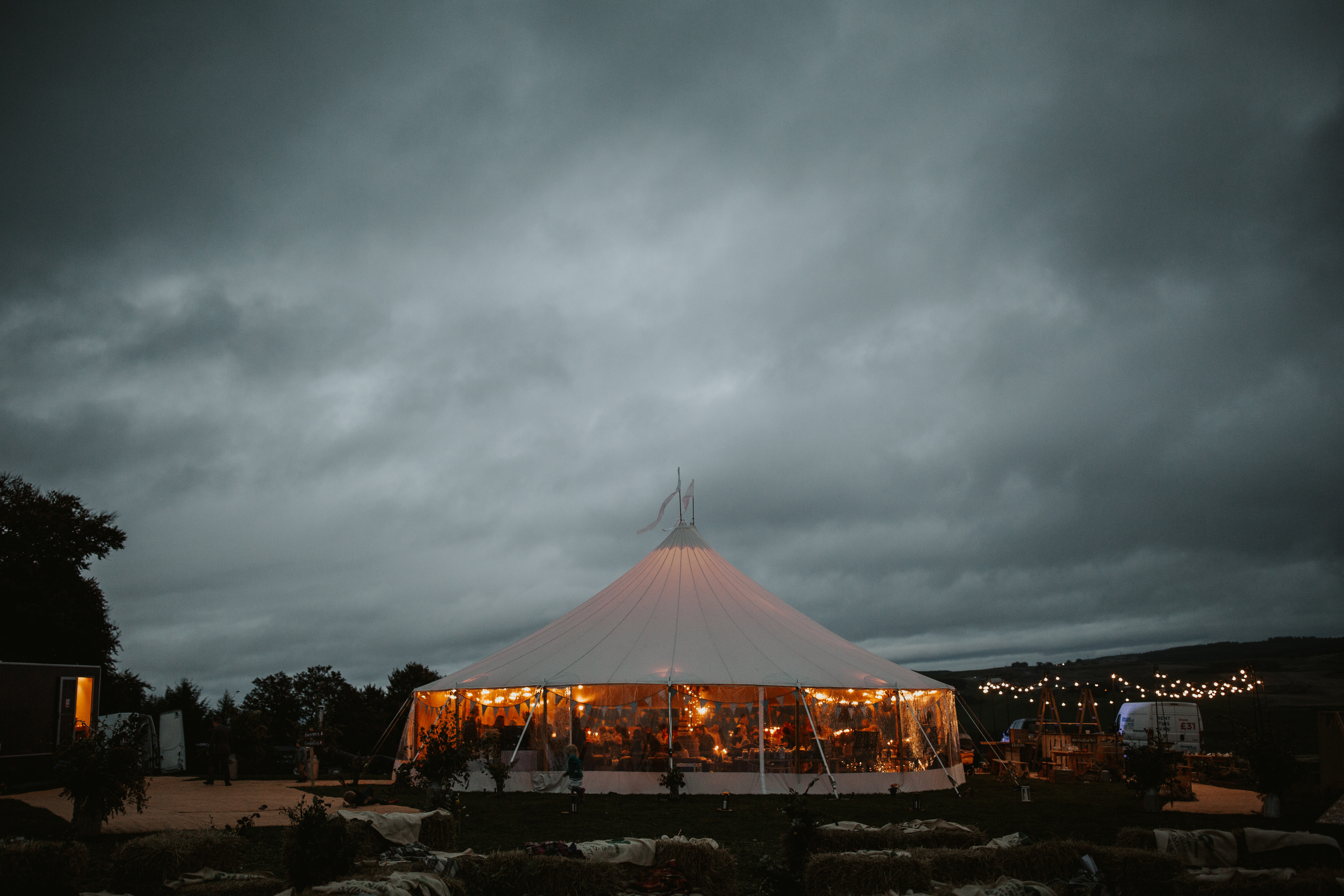 PapaKåta couple Eilidh & Lloyd's Sperry Wedding in Glenfarg, Perthshire captured by Colin Ross Photography- Sperry Tent Exterior at night PapaKåta couple Eilidh & Lloyd's Sperry Wedding in Glenfarg, Perthshire captured by Colin Ross Photography- Sperry Tent Exterior at night