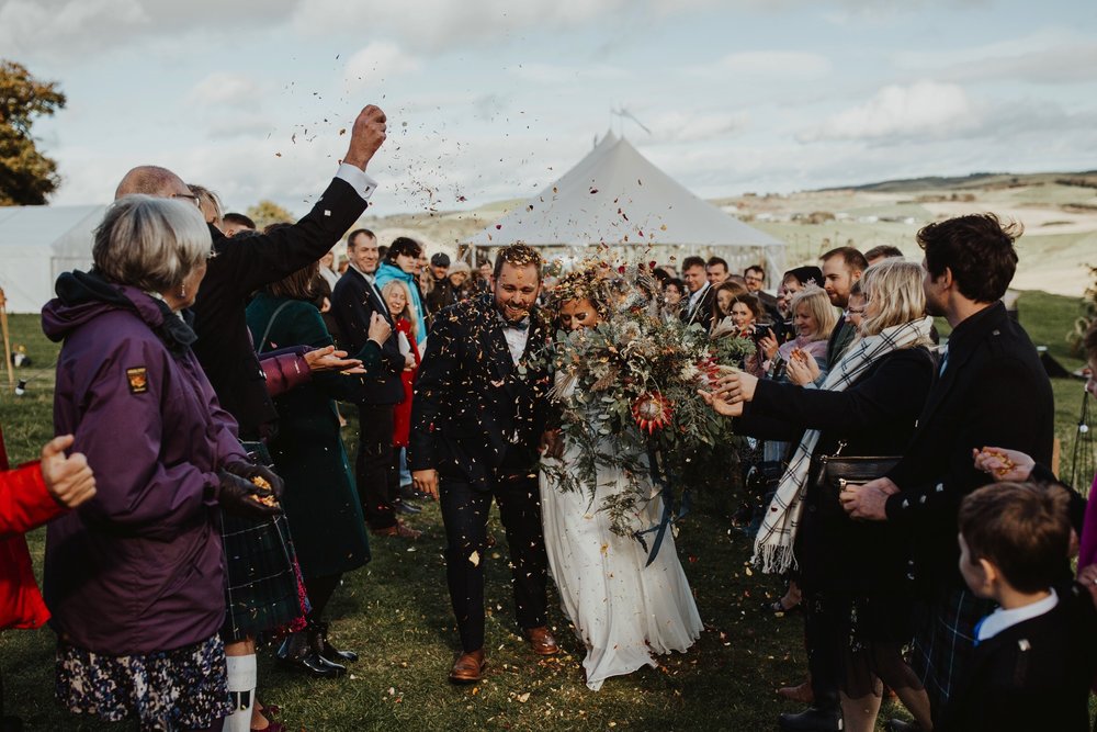 PapaKåta couple Eilidh & Lloyd's Sperry Wedding in Glenfarg, Perthshire captured by Colin Ross Photography- Confetti throw PapaKåta couple Eilidh & Lloyd's Sperry Wedding in Glenfarg, Perthshire captured by Colin Ross Photography- Confetti throw