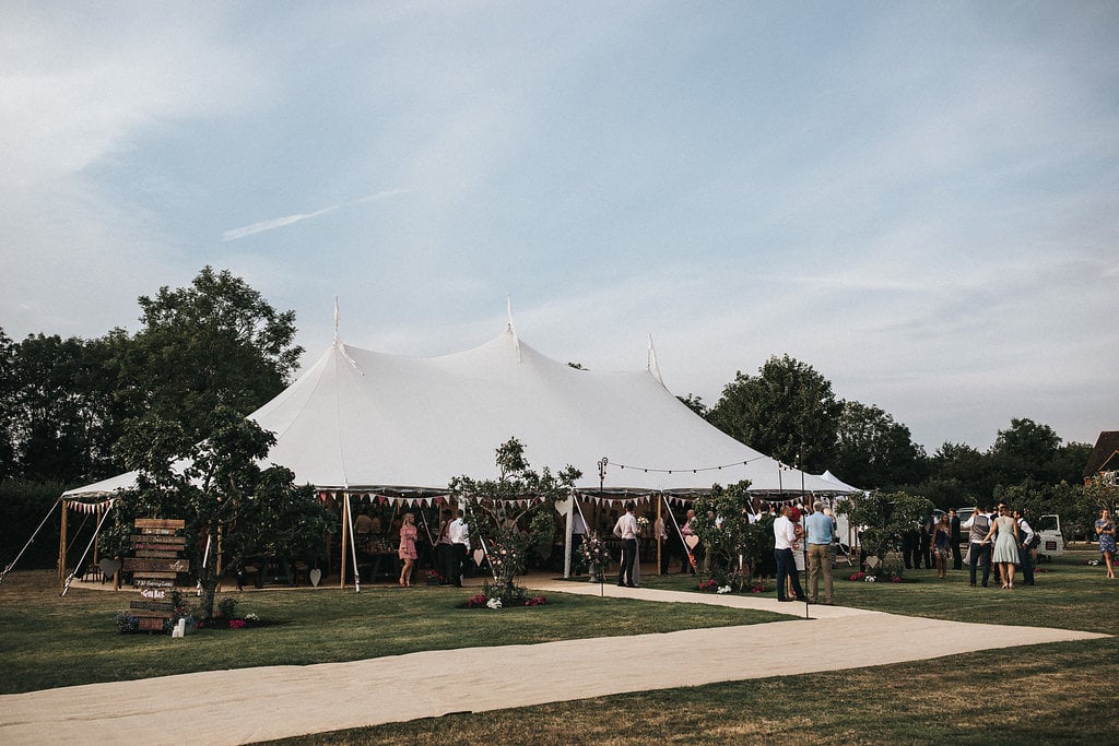 Katie & Thomas' PapaKåta Sperry Tent wedding in Thornborough, Bucks captured by Matt Horan Photography: Sperry Tent Exterior