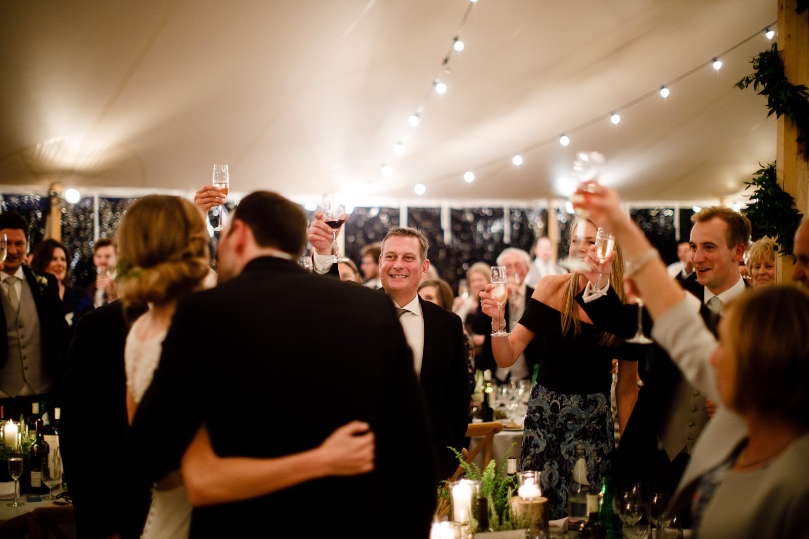 Emily & Ed's PapaKåta Sperry Tent wedding at Buckhurst Park captured by Tony Hart Photography: Toast To The Couple 