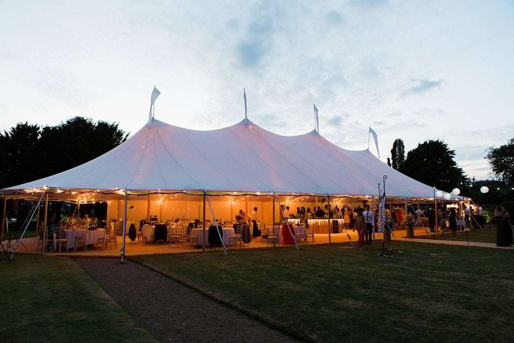 Georgie & Ben's PapaKåta Sperry Tent wedding at Newington House captured by Lucy Davenport: Sperry Tent exterior at night! 