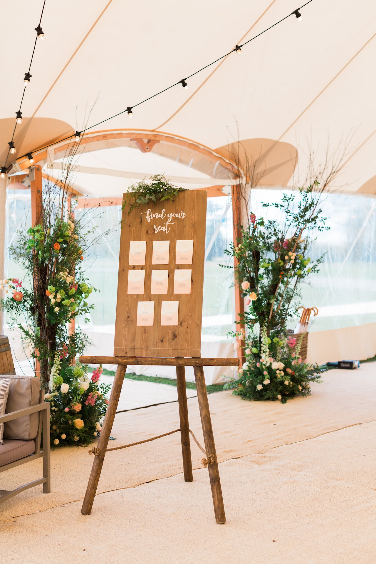 PapaKåta Spring Open Weekend Sperry Tent captured by Lucy Davenport Photography: Sperry Archway with Table Plan by Lonetree Weddings