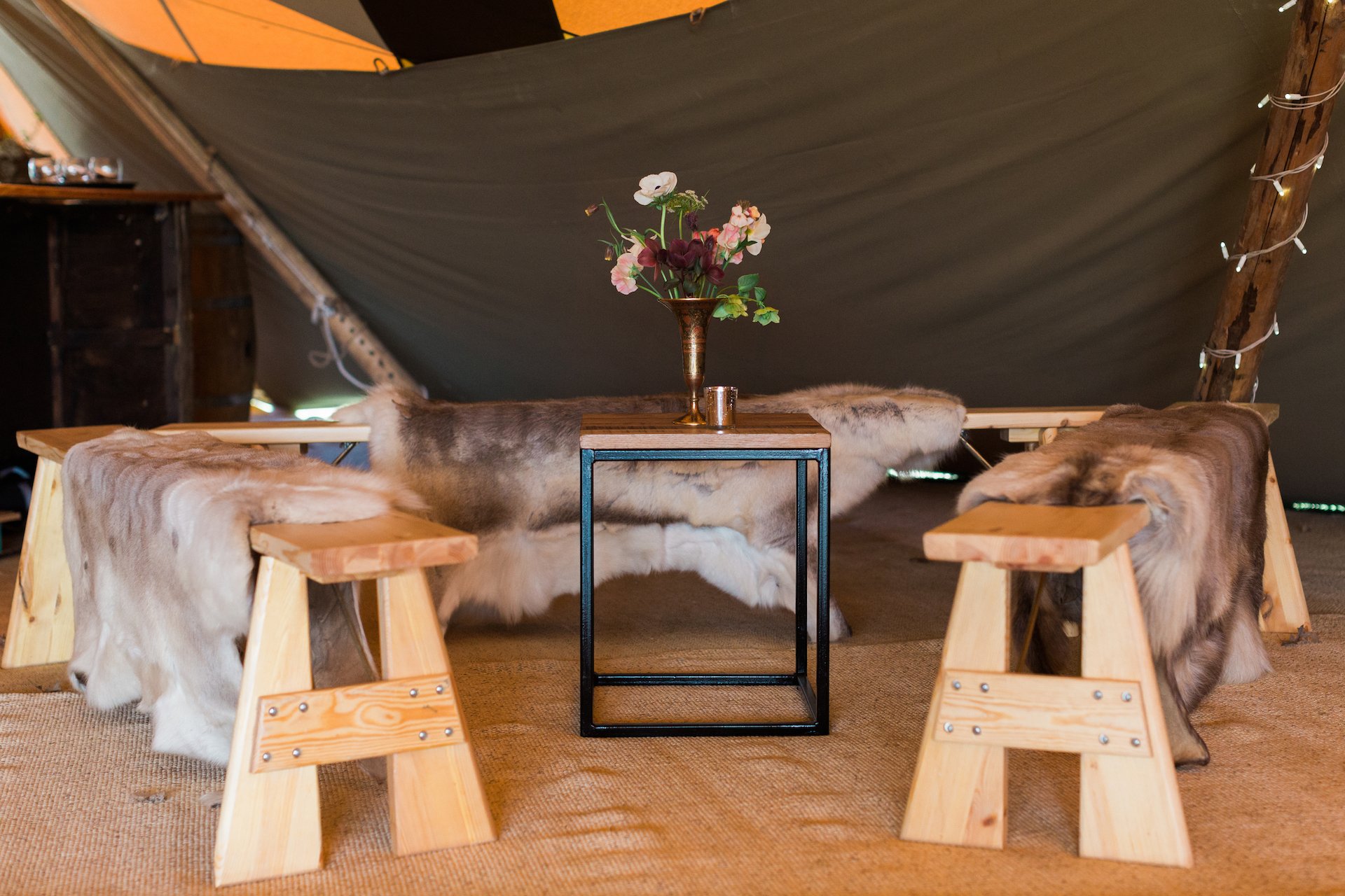 PapaKåta Spring Open Weekend Teepee captured by Lucy Davenport Photography: Chill Out Snug with Reindeer Skins