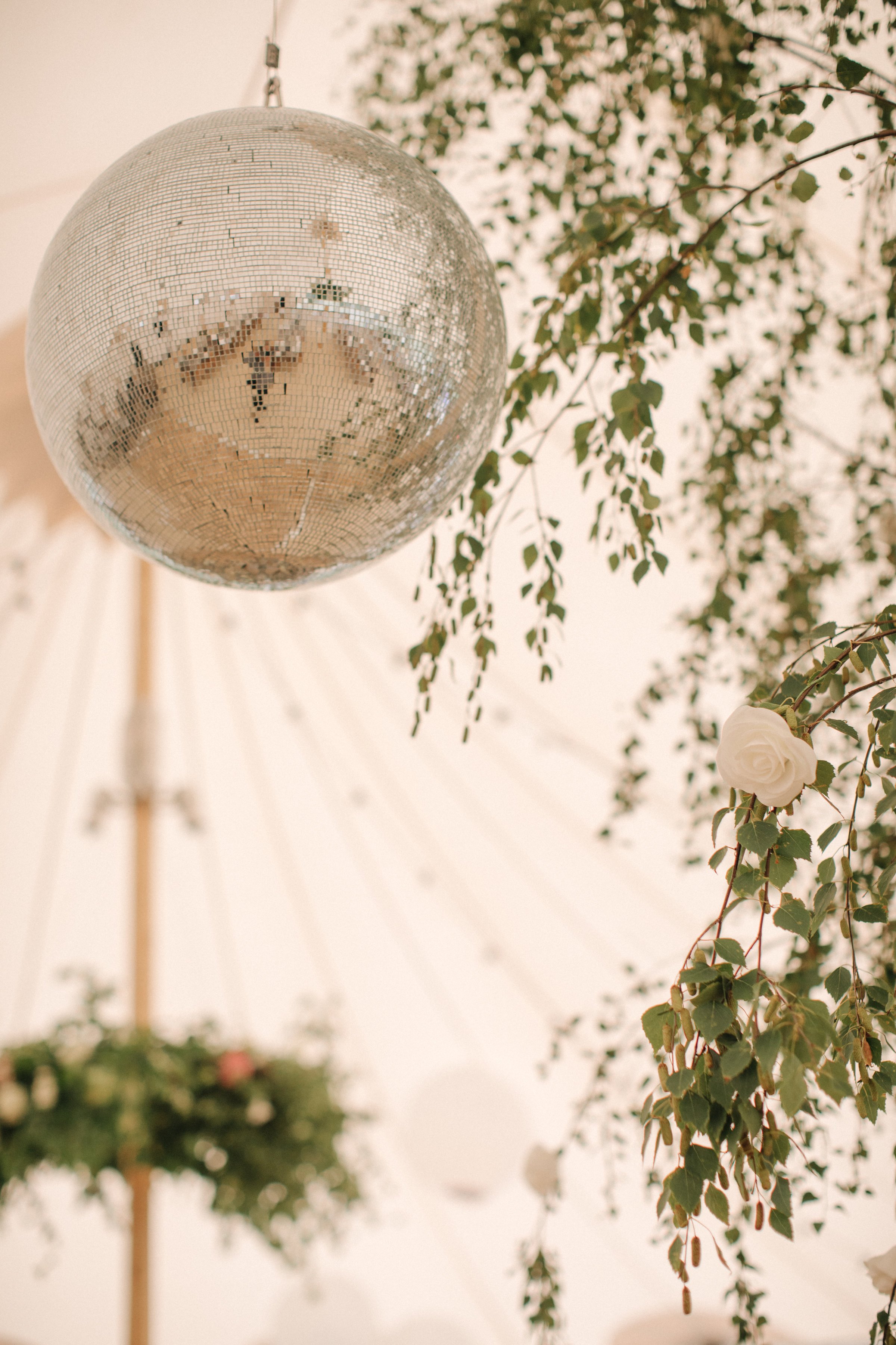 Steph & Ed's PapaKåta Sperry Tent wedding at home in Nottingham captured by M & J Photography: Sperry Tent Mirror Ball 