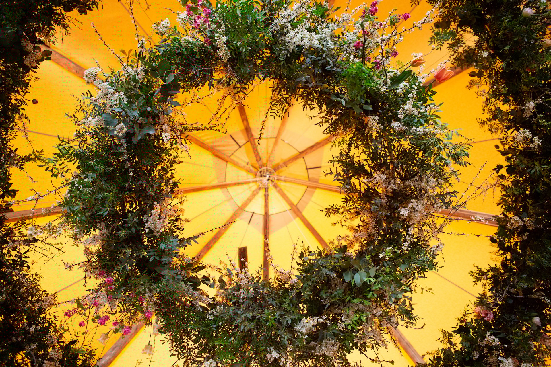PapaKåta Spring Open Weekend Teepee captured by Lucy Davenport Photography: Two Tier Floral Hoop with flowers by Aelisabet Flowers 
