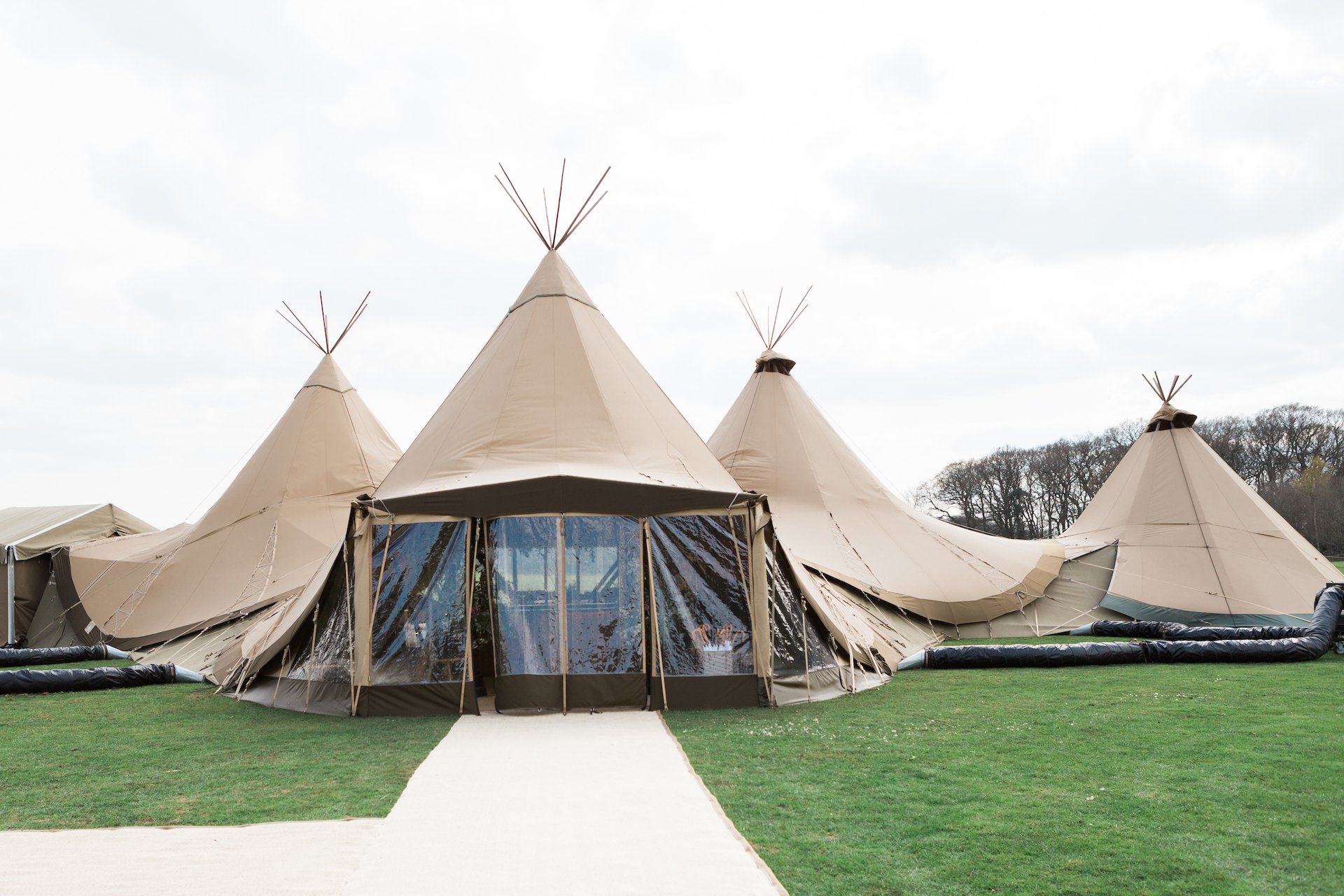 PapaKåta Spring Open Weekend Teepee captured by Lucy Davenport Photography: Teepee Tent Exterior with Wallflex Door