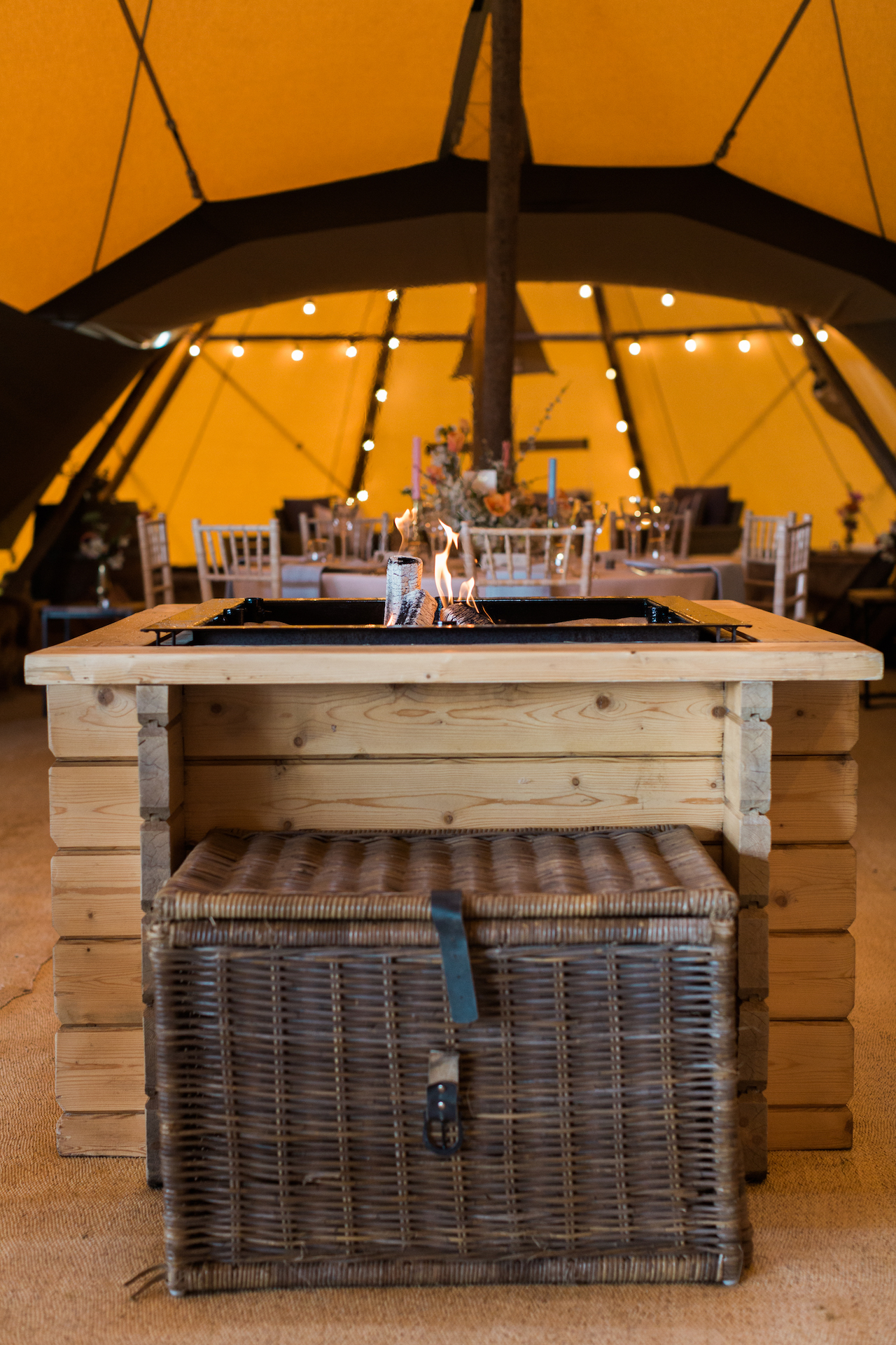PapaKåta Spring Open Weekend Teepee captured by Lucy Davenport Photography: Teepee Open Fireplace and Log Basket