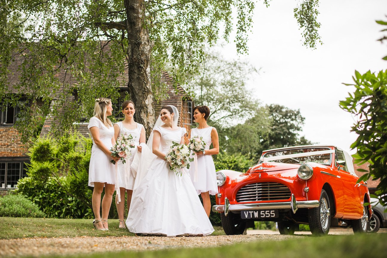 Charlotte & Tony Papakata Sperry Tent Wedding, Hampshire, Doug Treiber Photography; Bridal Party with Car