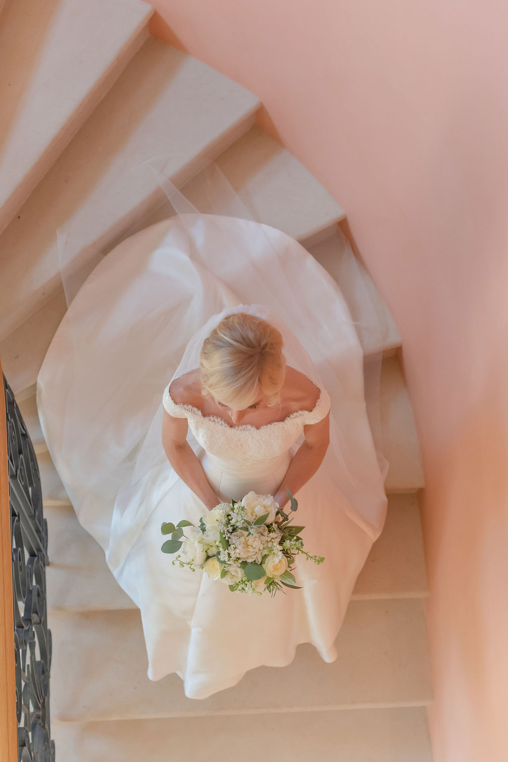 Amanda & Jono PapaKåta Sperry Tent Wedding, Rockley Manor, Flo Brooks Photography; Bride on Staircase