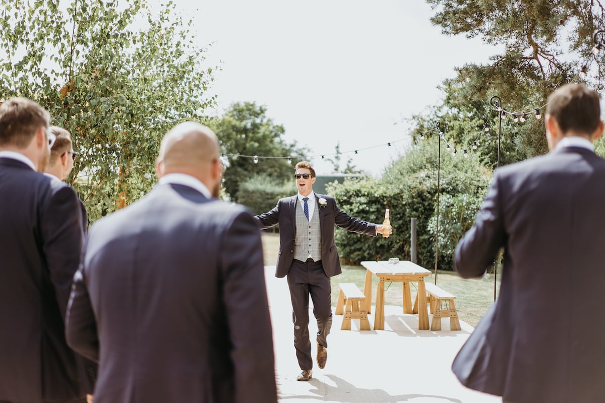 Anna & Luke PapaKåta Sperry Tent Wedding, Cambridgeshire, Matthew Wilkinson Photography; Happy Groom