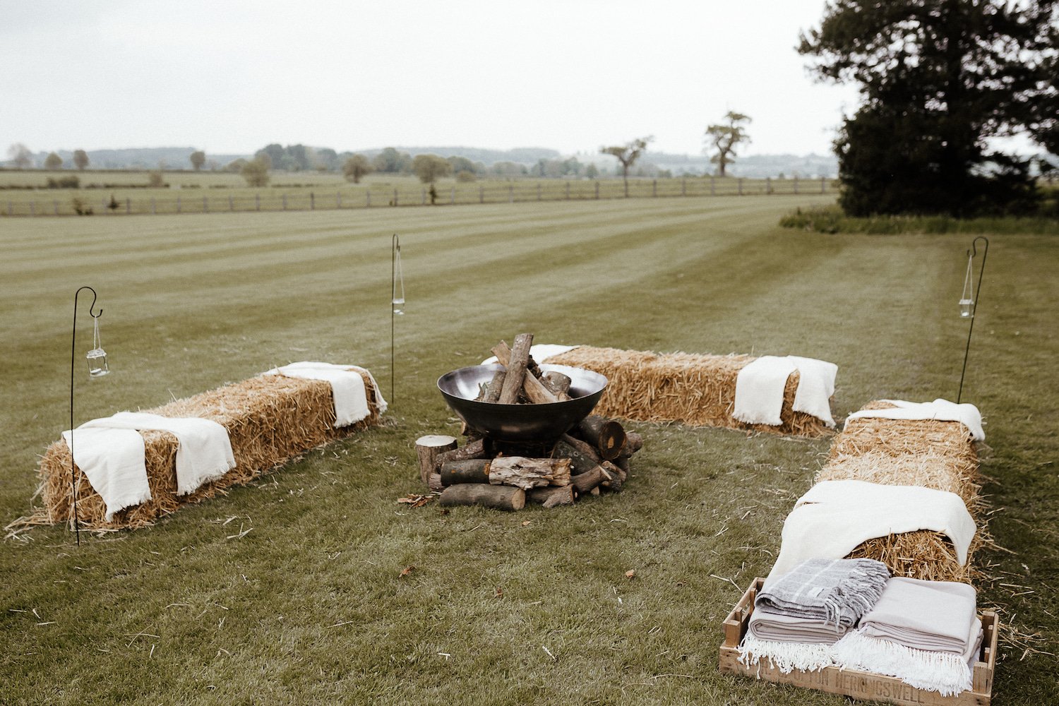 India & Sean PapaKåta Sperry Tent Wedding in Lincolnshire, Yorkshire, Caitlin & Jones Photography; Hay Bale Seating
