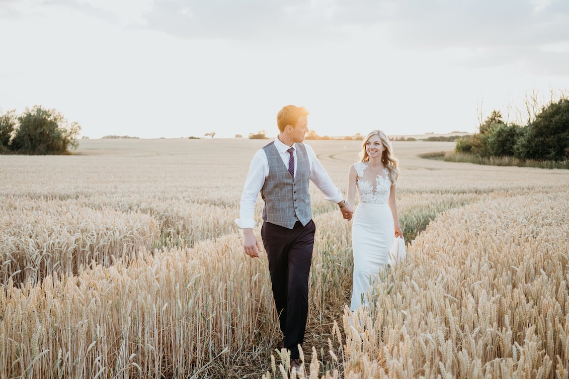 Anna & Luke PapaKåta Sperry Tent Wedding, Cambridgeshire, Matthew Wilkinson Photography; Bride & Groom Holding Hands