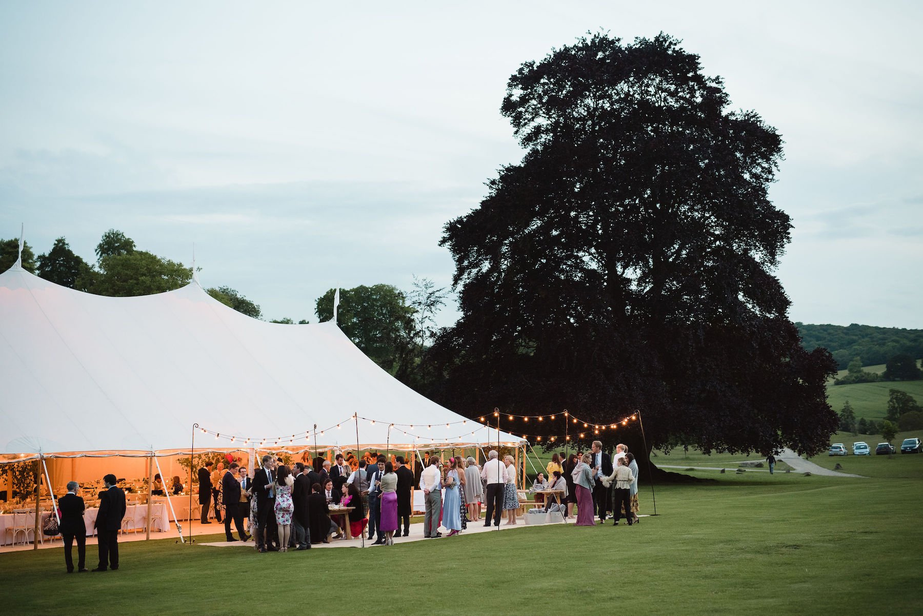 Frances & Ivo PapaKåta Sperry Tent Wedding at the Beautiful Stonor Park, Oxfordshire, Emma Hare Photography; Night Time Sperry Exterior 