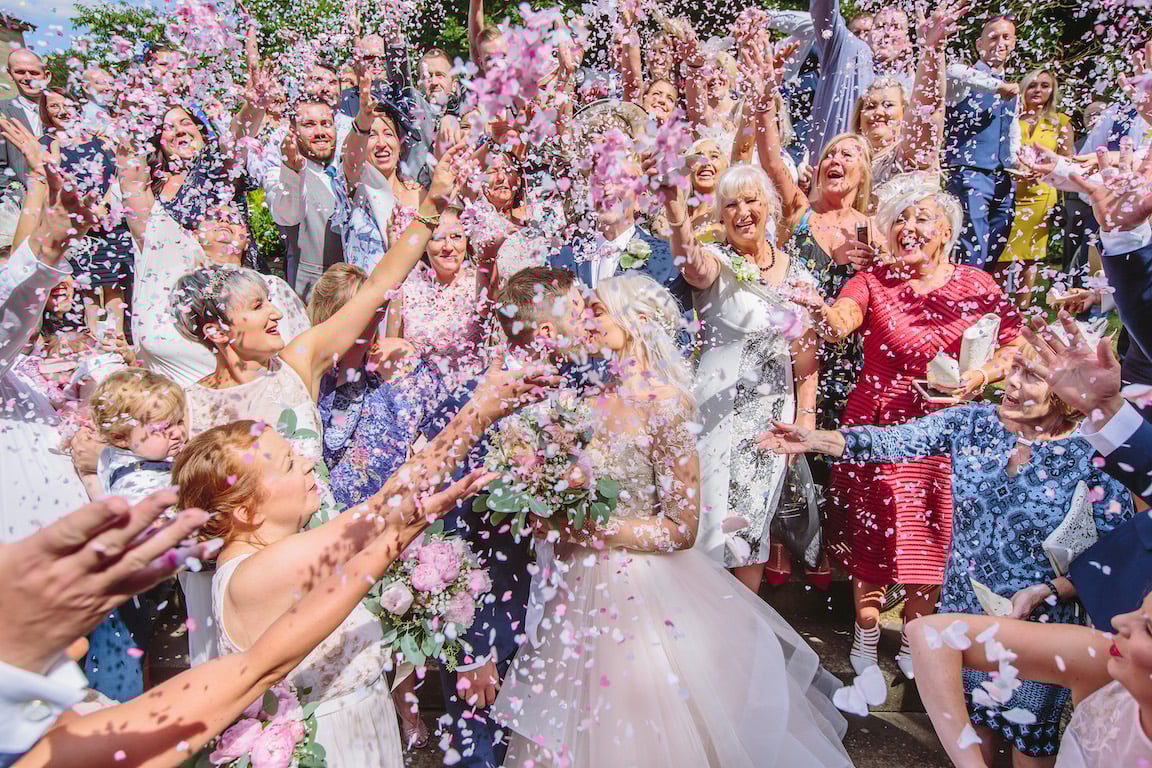 Sarah & Greg PapaKåta Sperry Tent Wedding at Saltmarshe Hall in Howden, Yorkshire. Photographed by Barnaby Aldrick; Pink Confetti Throw