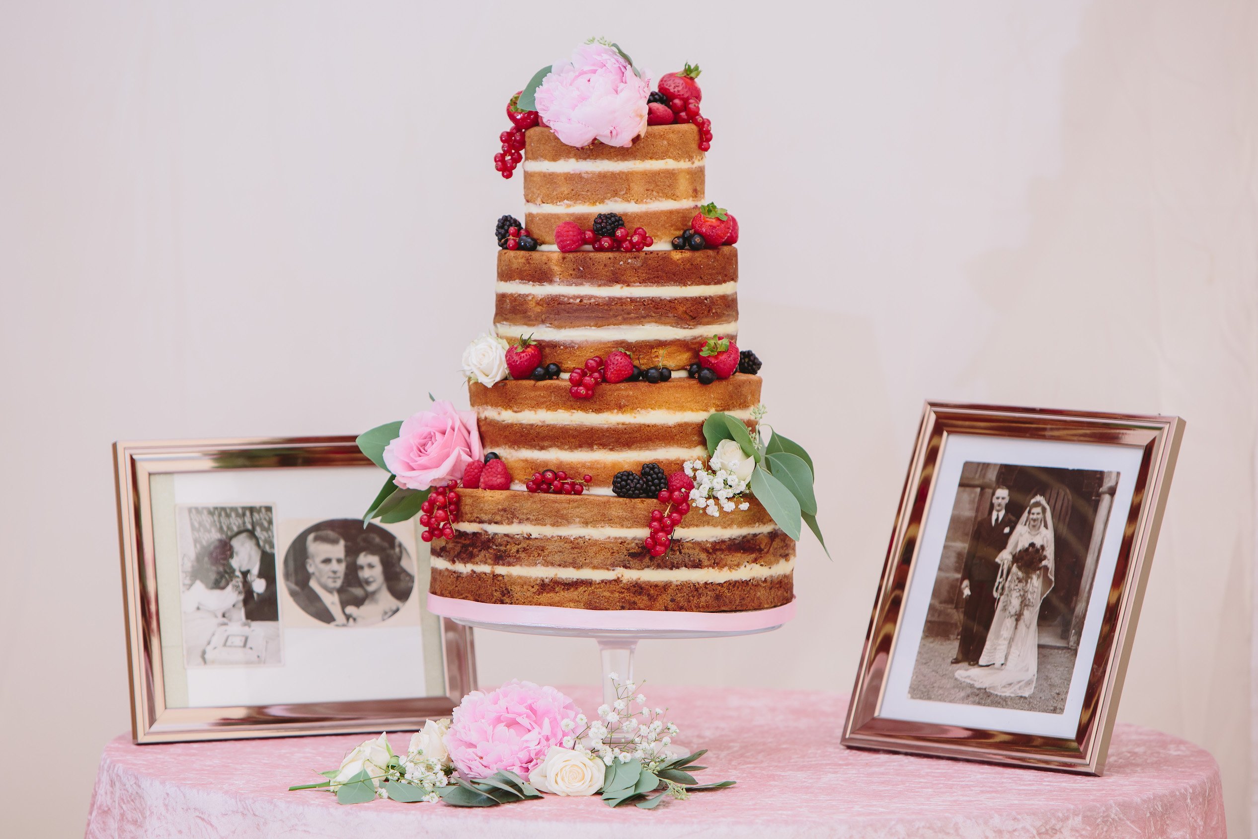 Sarah & Greg PapaKåta Sperry Tent Wedding at Saltmarshe Hall in Howden, Yorkshire. Photographed by Barnaby Aldrick; Naked Wedding Cake