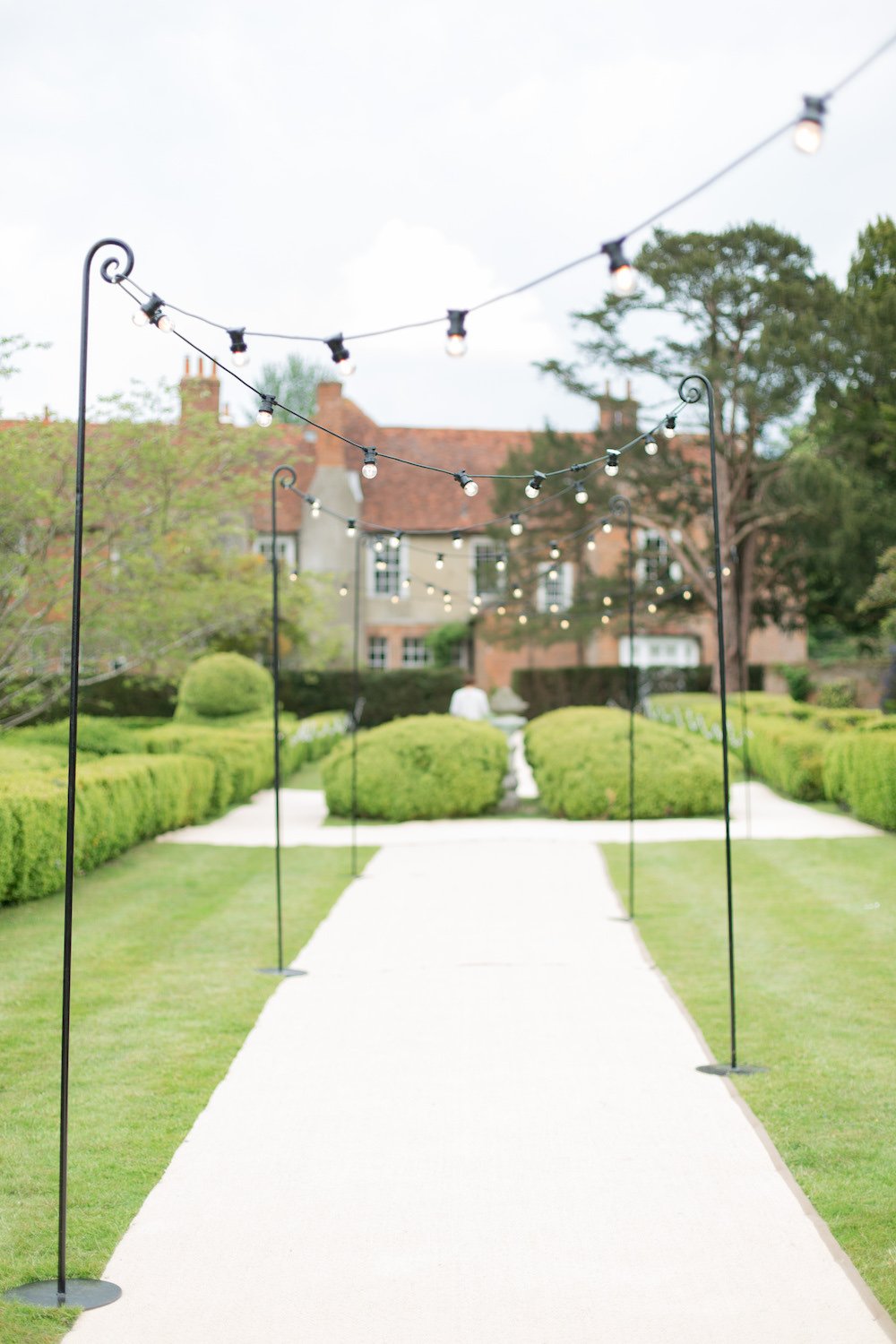 Hannah & Tom Stunning PapaKåta Sperry Tent Wedding in West Horsley, Surrey. Captured Beautifully by Helen Warner Photography; Festoon Walkway