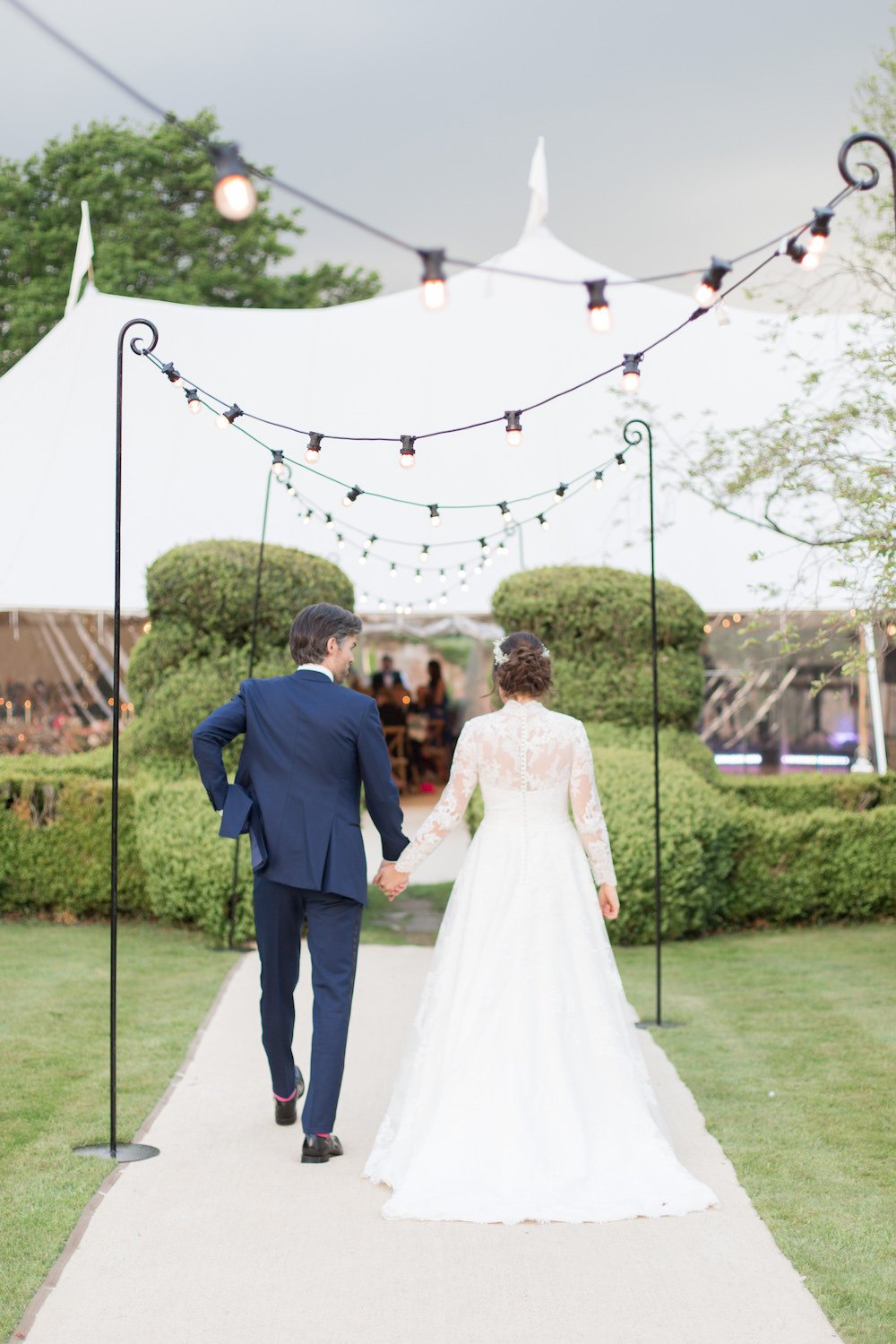 Hannah & Tom Stunning PapaKåta Sperry Tent Wedding in West Horsley, Surrey. Captured Beautifully by Helen Warner Photography; Holding Hands