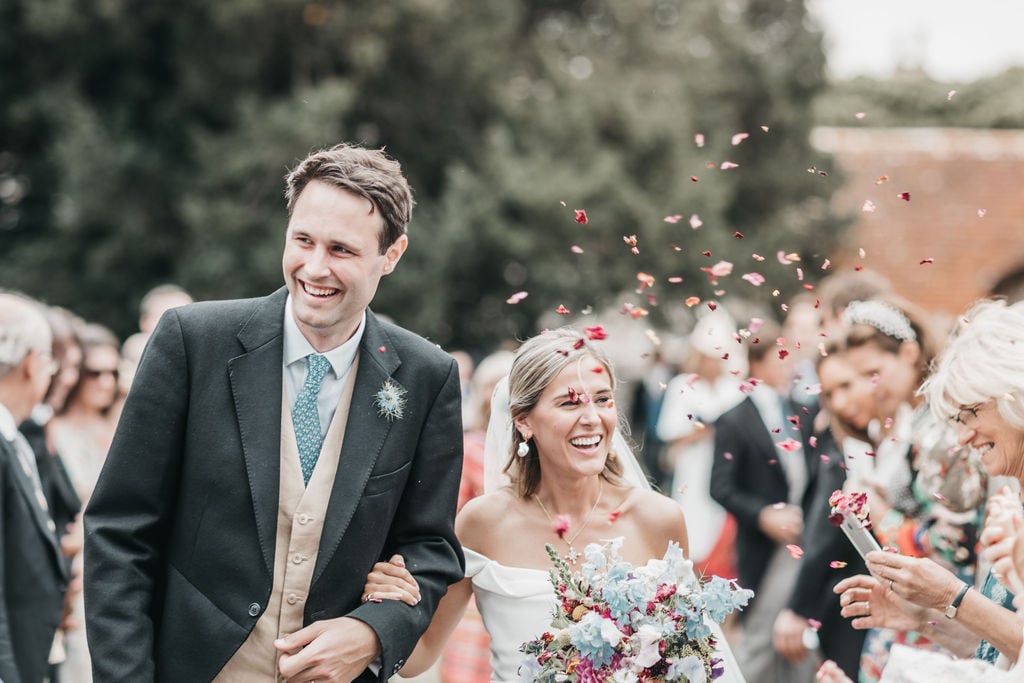 Lottie & Lanto's stunning PapaKåta Tipi & Sperry Tent Wedding in Shipley, West Sussex. Photography by Ben Wigglesworth; Just Married Confetti Throw
