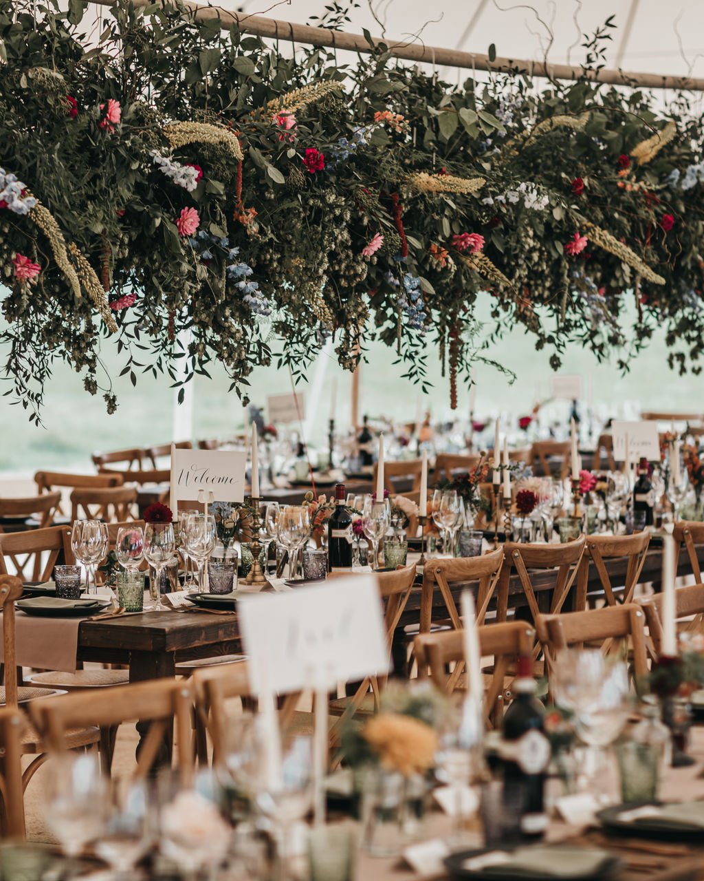 Lottie & Lanto's stunning PapaKåta Tipi & Sperry Tent Wedding in Shipley, West Sussex. Photography by Ben Wigglesworth; Sperry Floral Arrangement