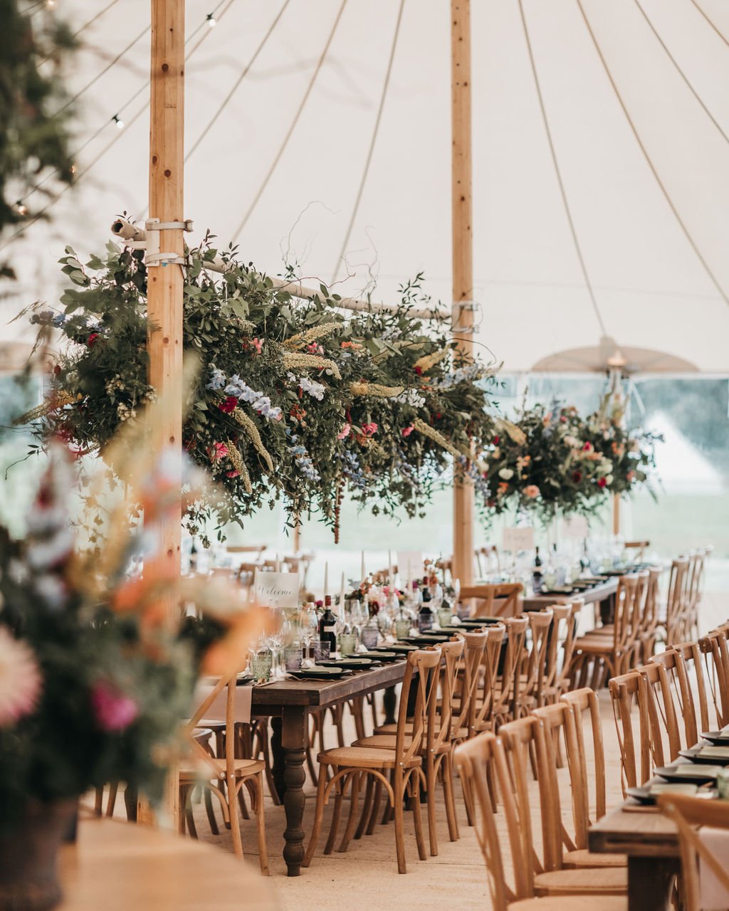 Lottie & Lanto's stunning PapaKåta Tipi & Sperry Tent Wedding in Shipley, West Sussex. Photography by Ben Wigglesworth; Beautiful Sperry Interior