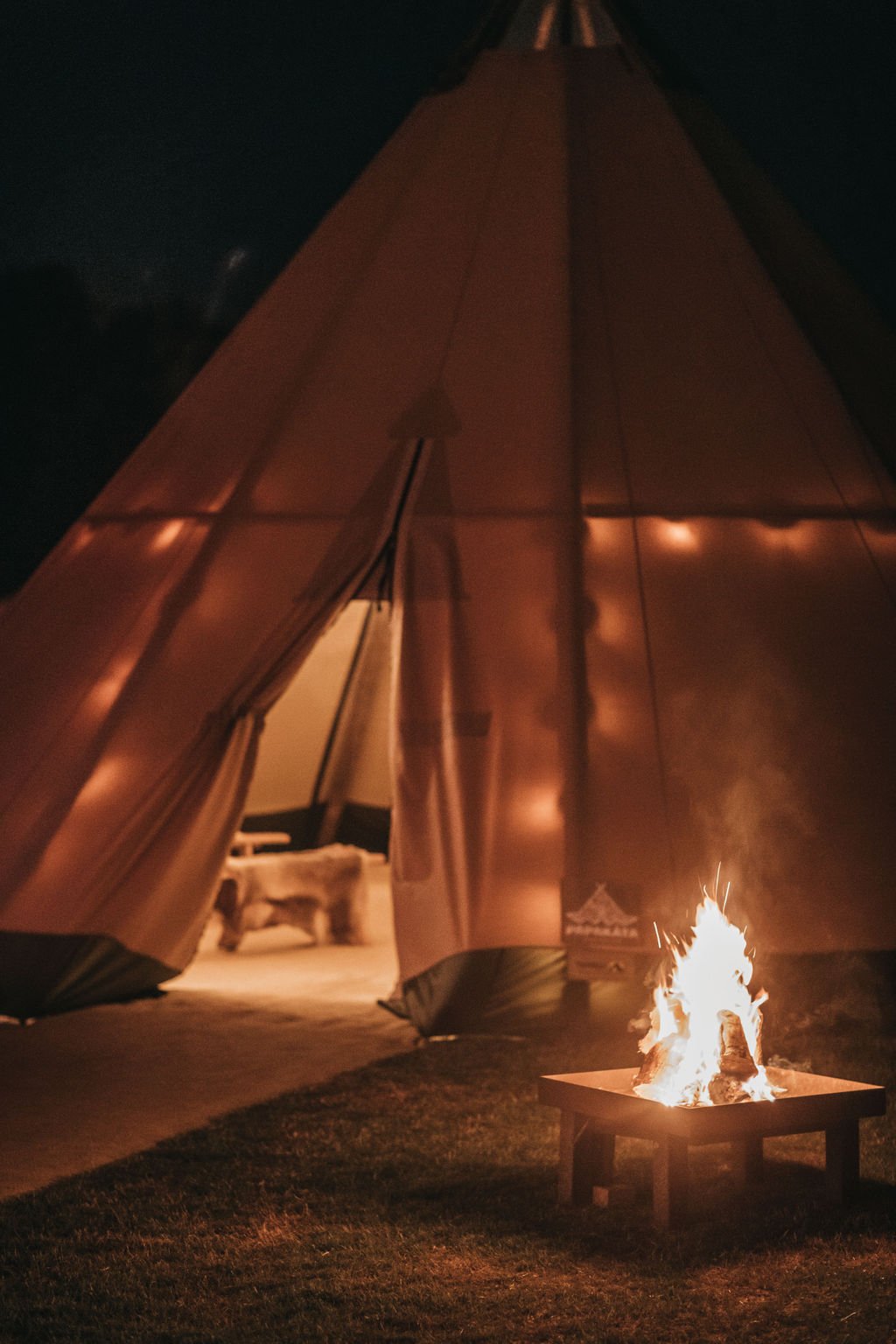 Lottie & Lanto's stunning PapaKåta Tipi & Sperry Tent Wedding in Shipley, West Sussex. Photography by Ben Wigglesworth; Tipi Fire Pit