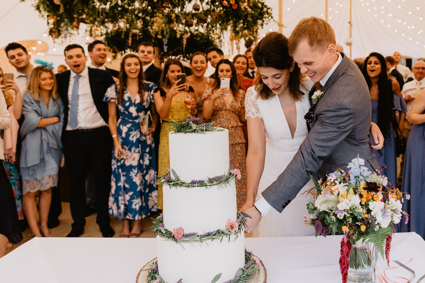 Jess & James stunning PapaKåta Sperry & Tipi Tent Wedding in Aldworth, Berkshire. Photographed beautifully by Benjamin Stuart Photography; Cutting The Cake