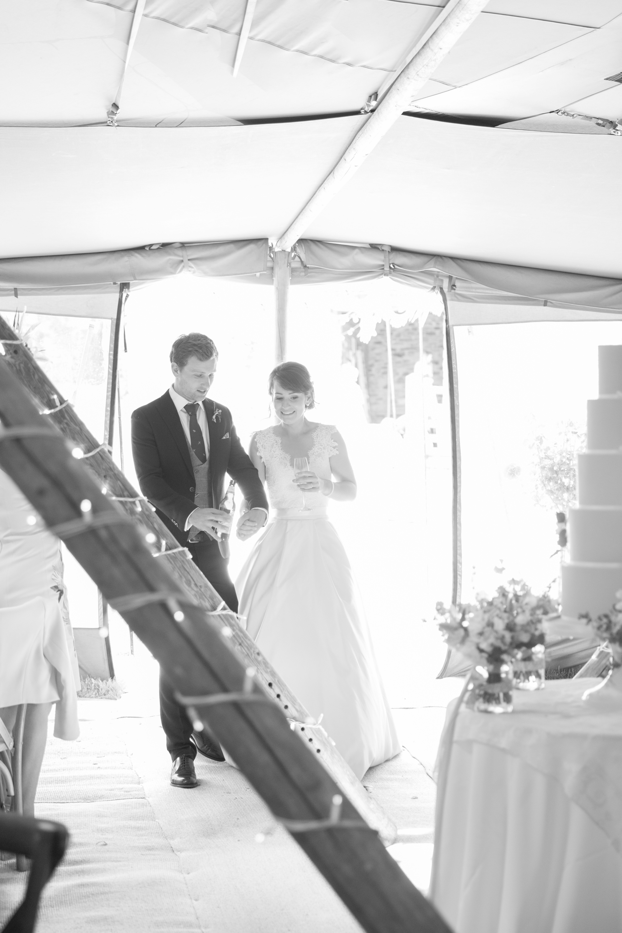 Jess & Rob's stunning PapaKåta Tipi Tent Wedding in Ilkley, West Yorkshire. Photography by Helen Warner; Entering the Tipi