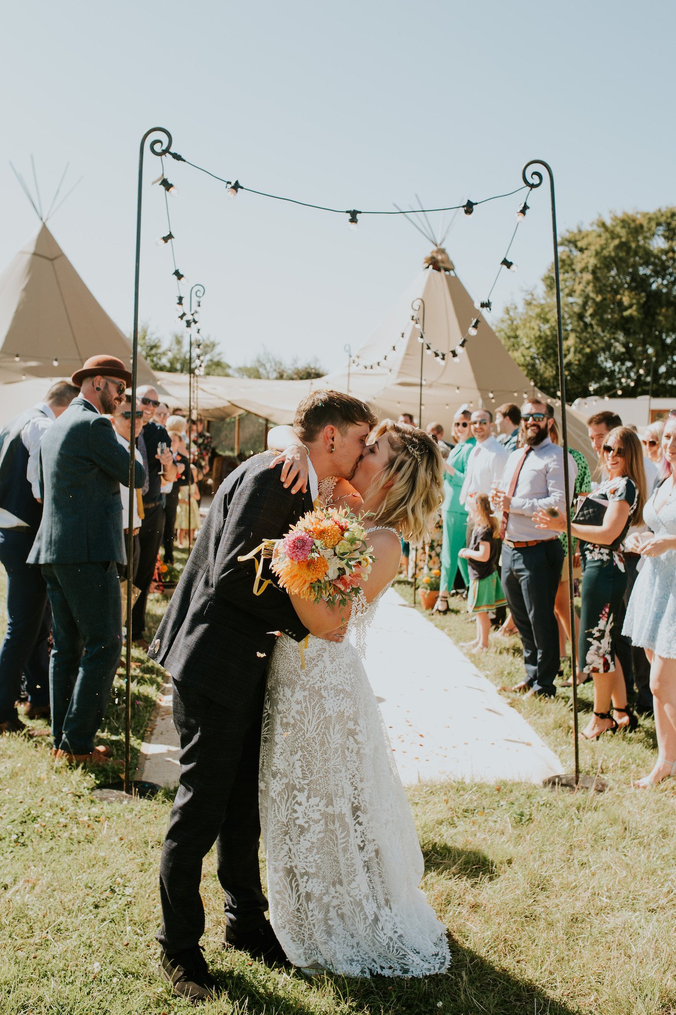 Katie & Tim Gorgeous PapaKåta Tipi Tent Wedding at Hawbridge Farm. Photographed by Hayley Savage Photography; Kiss the Bride!