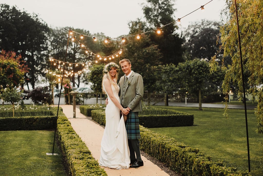 Ruth & Alex PapaKåta Sperry Tent Wedding in Angus, Scotland. Photographed by Anna Urban Photography; Festoon Walkway