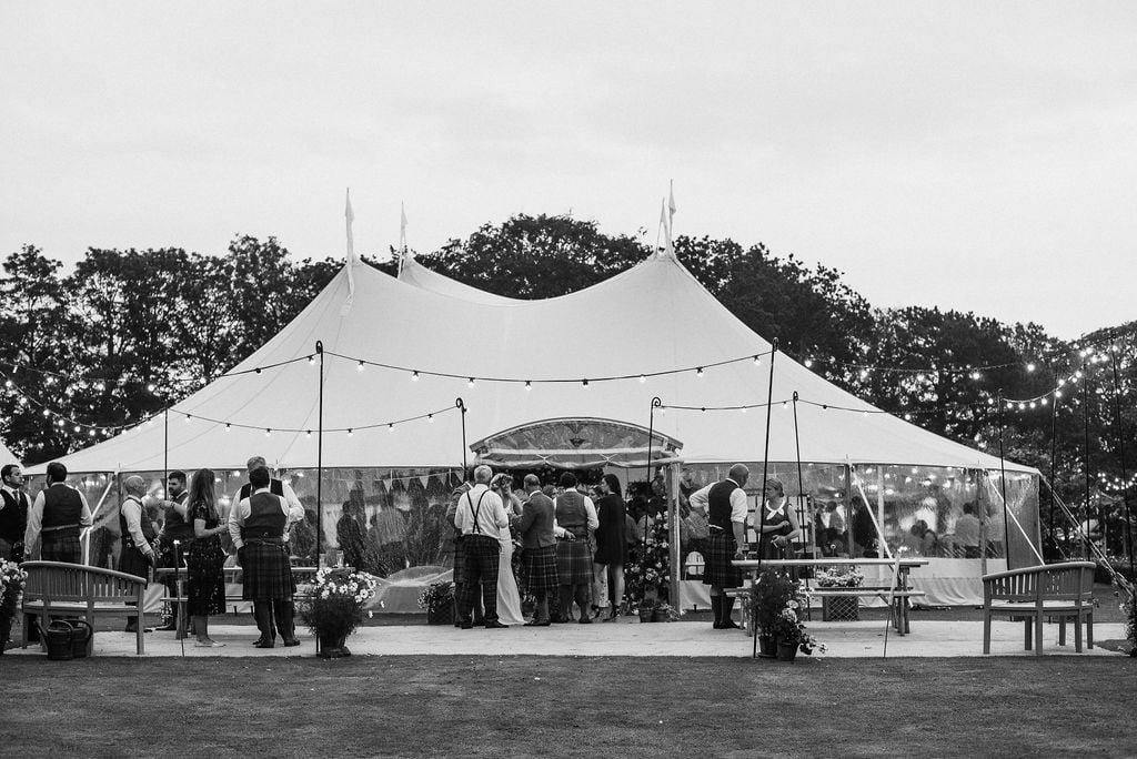 Ruth & Alex PapaKåta Sperry Tent Wedding in Angus, Scotland. Photographed by Anna Urban Photography; Stunning Black and White Sperry Exterior