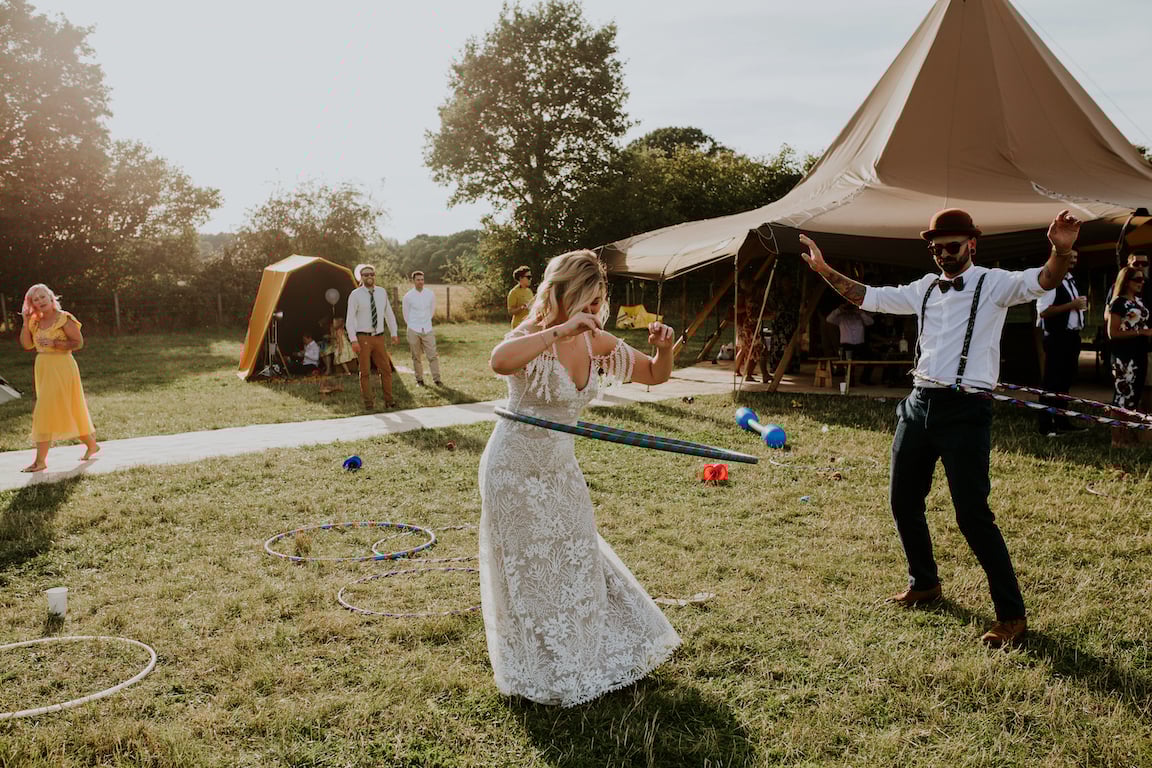 Katie & Tim Gorgeous PapaKåta Tipi Tent Wedding at Hawbridge Farm. Photographed by Hayley Savage Photography; Hula Hoop Fun!