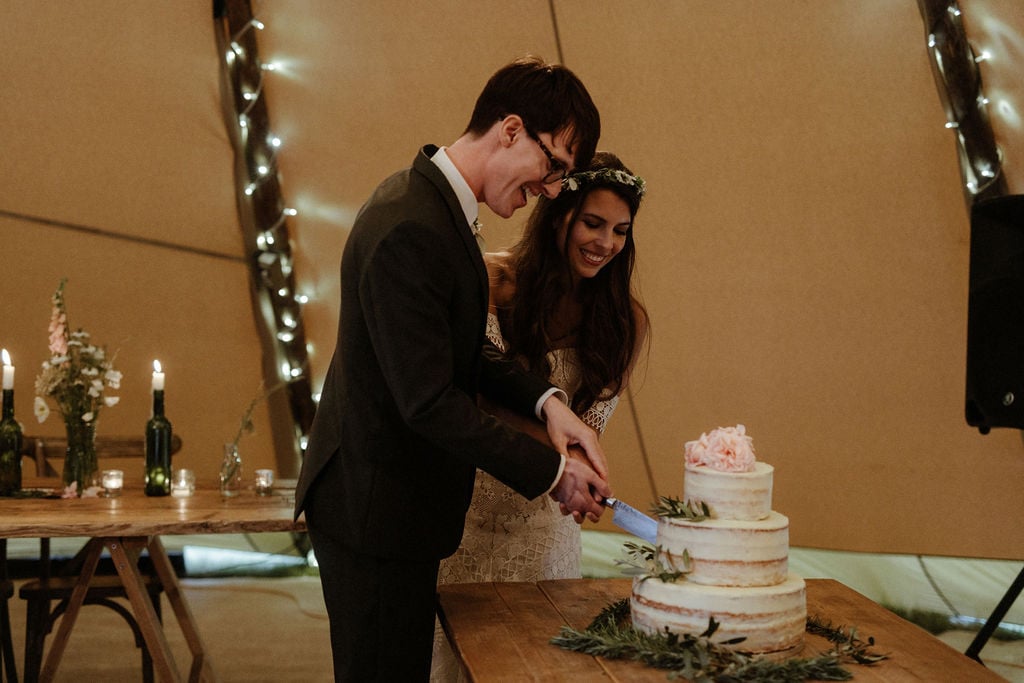 Georgie & Will Stunning PapaKåta Tipi Tent Wedding near Henley-on-Thames, Oxfordshire. Captured beautifully by Olivia & Dan Photography; Cut the Cake