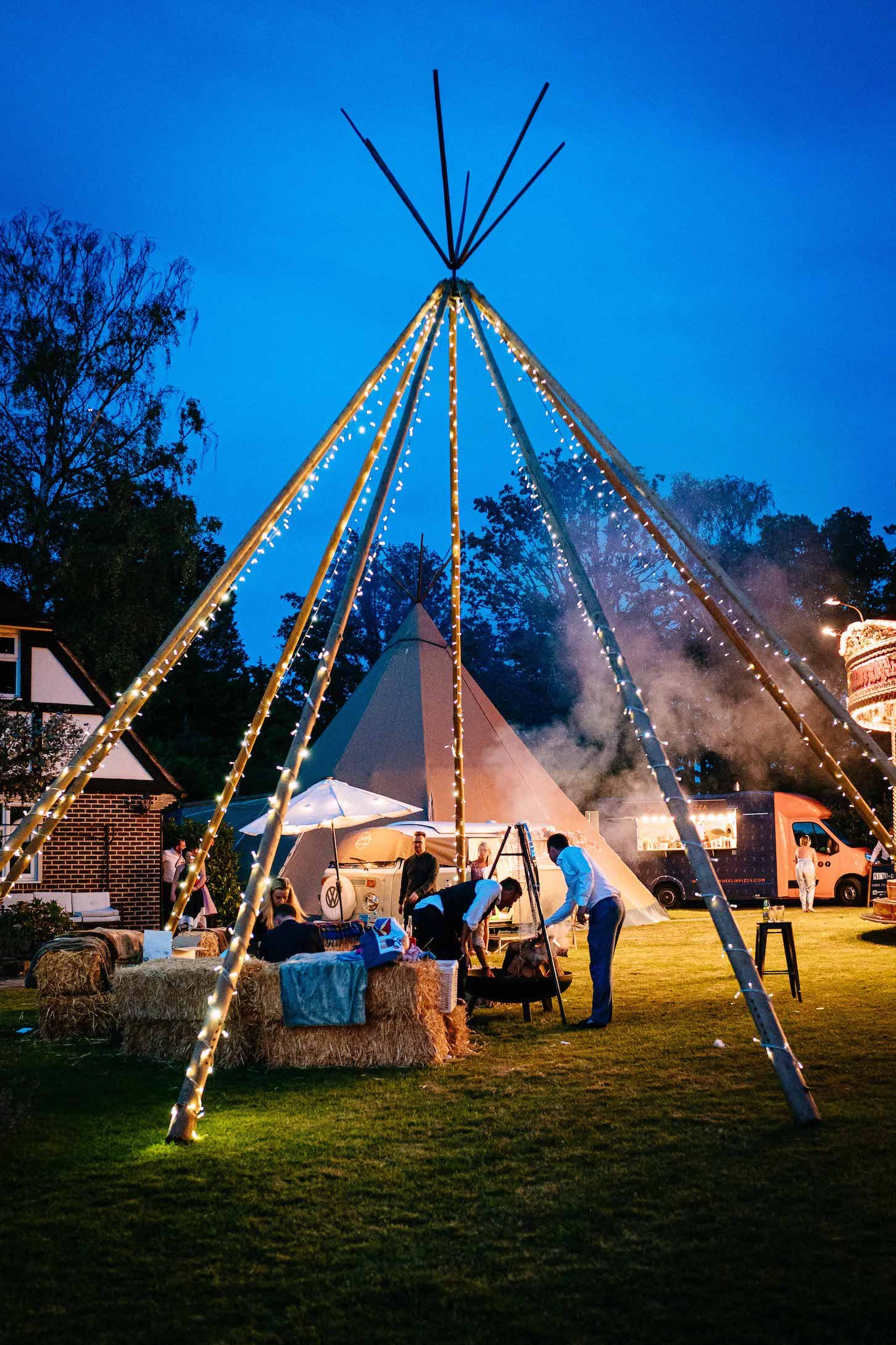 Tara & Garry Beautiful PapaKåta Sperry Tent & Naked Tipi Wedding in Virginia Water, Sarah Legge Photography; Lit Up Naked Tipi at Night