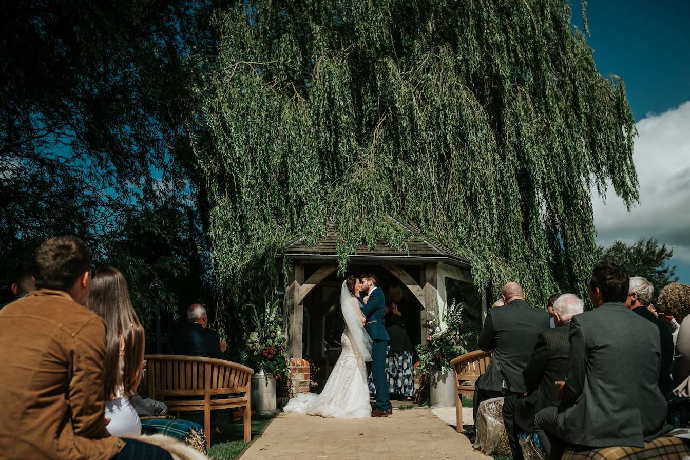 Leanne & Michael Gorgeous PapaKåta Tipi Tent Wedding in North Yorkshire, Photography by Charli; Kiss the Bride!