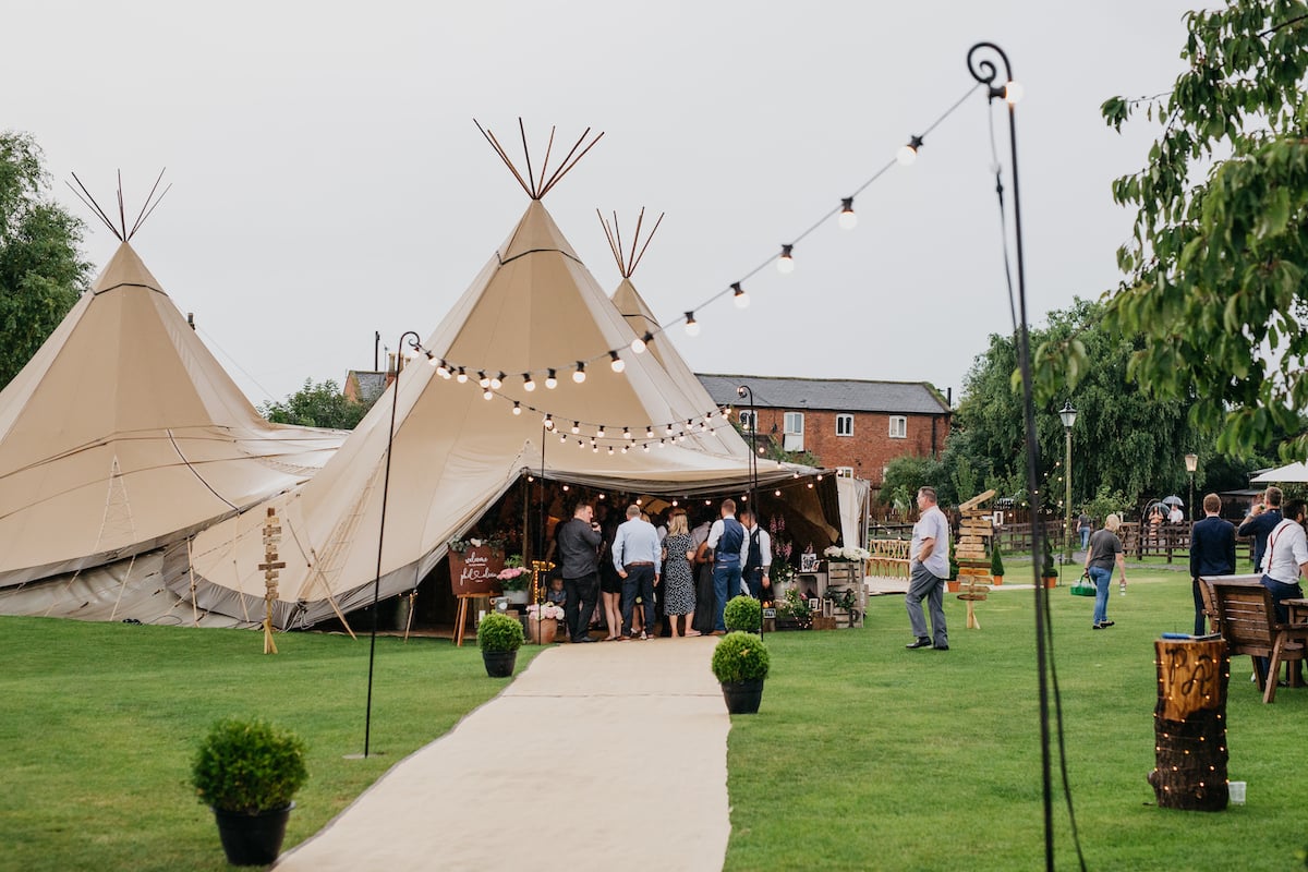Alicia & Phil Gorgeous PapaKåta Tipi Tent Wedding in North Yorkshire. Photographed by John Hope Photography; Festoon Walkway 